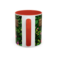 Mug with floral design and red interior on a white background