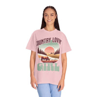 Woman wearing pink Country Lovin Girl T-shirt with vintage countryside graphic and text