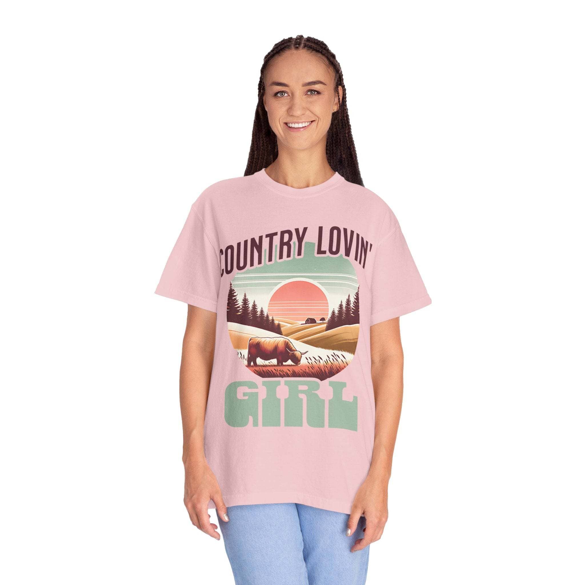 Woman wearing pink Country Lovin Girl T-shirt with vintage countryside graphic and text