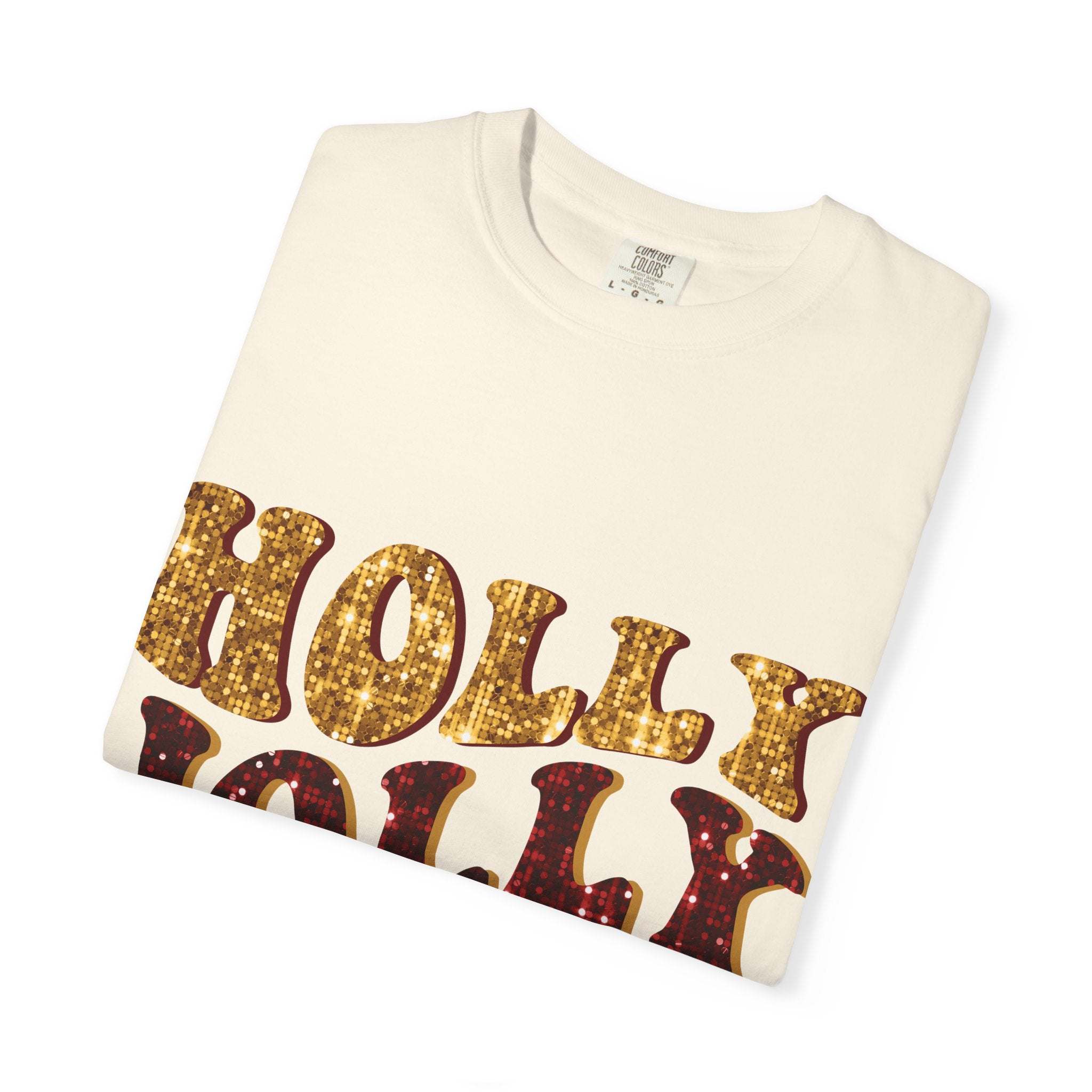 Faux Glitter Holly Jolly Mama festive cotton t-shirt folded on white background