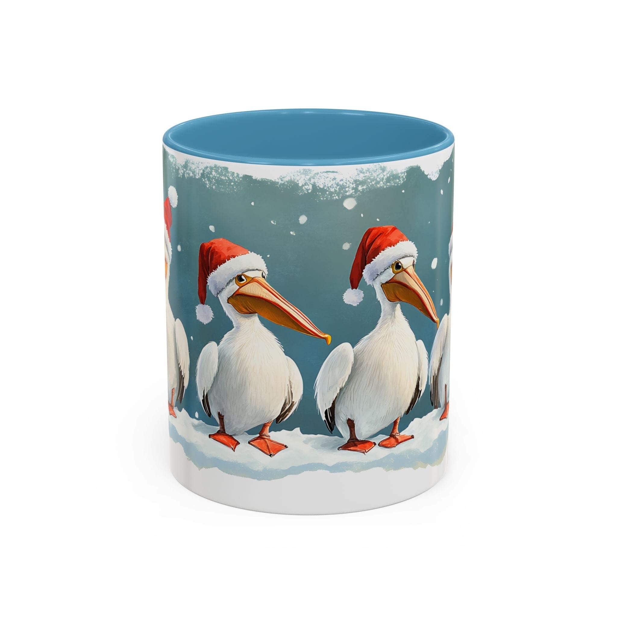 Mug with Christmas design featuring pelicans wearing Santa hats on a snowy background.