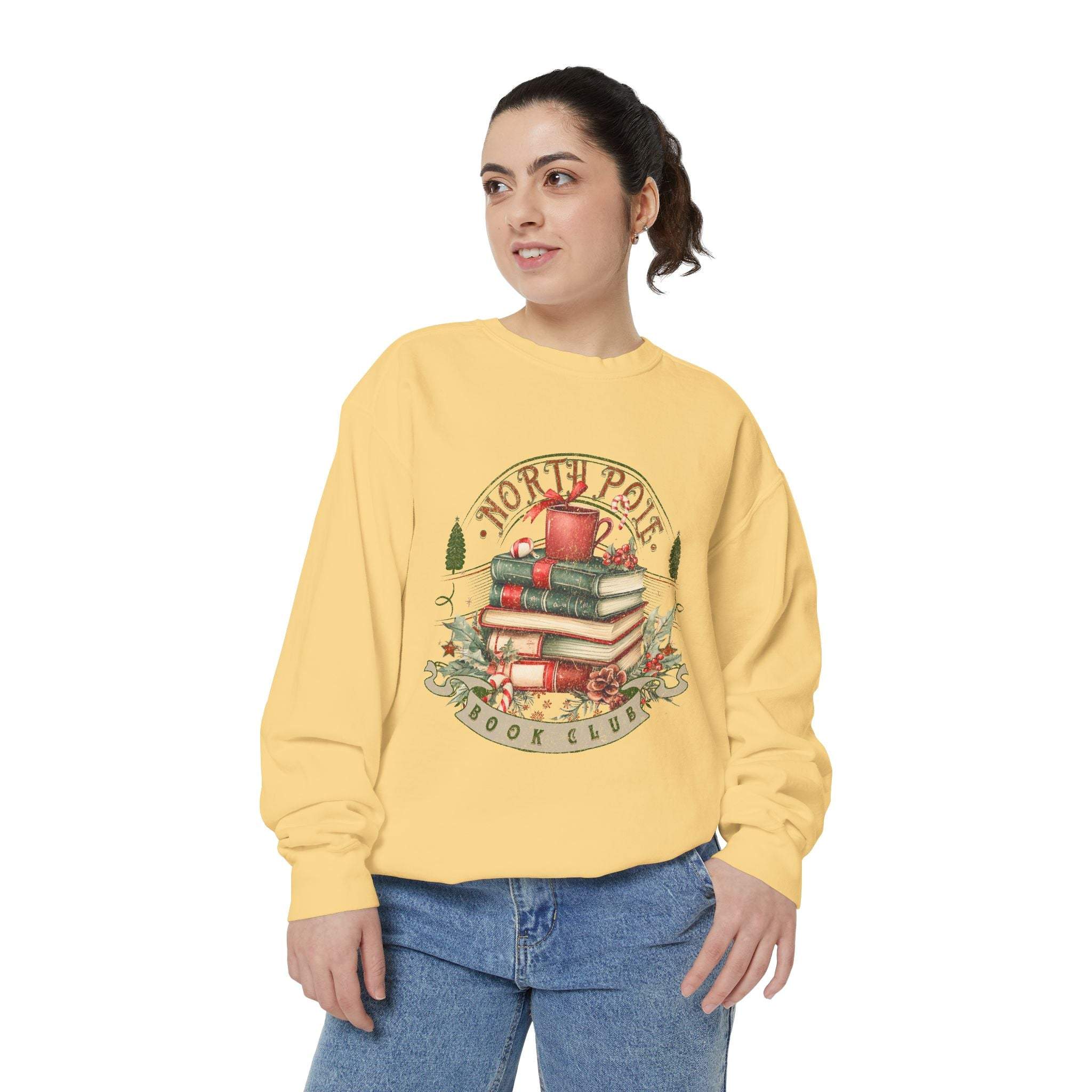 Vintage North Pole Book Club sweatshirt in soft cotton blend with festive book stack design on yellow background