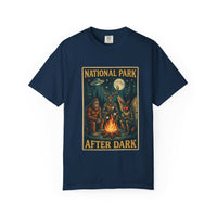 National Park After Dark t-shirt featuring campfire, Sasquatch, and Mothman nocturnal scene