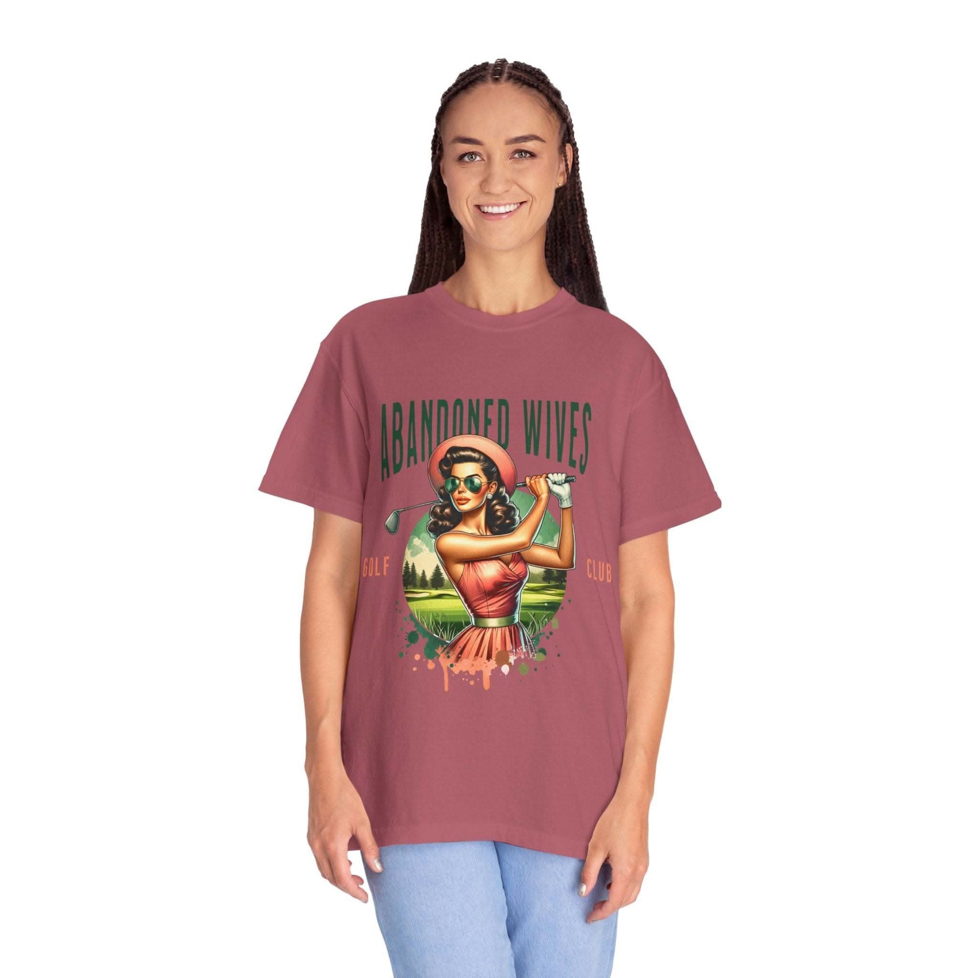 Vintage unisex t-shirt with Abandoned Wives Golf Club design featuring a retro woman golfer illustration