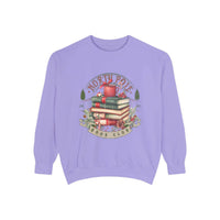 Vintage North Pole Book Club sweatshirt with stack of books and holiday design on lavender background