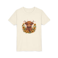 Youth tee featuring a Highland cow surrounded by sunflowers floral design