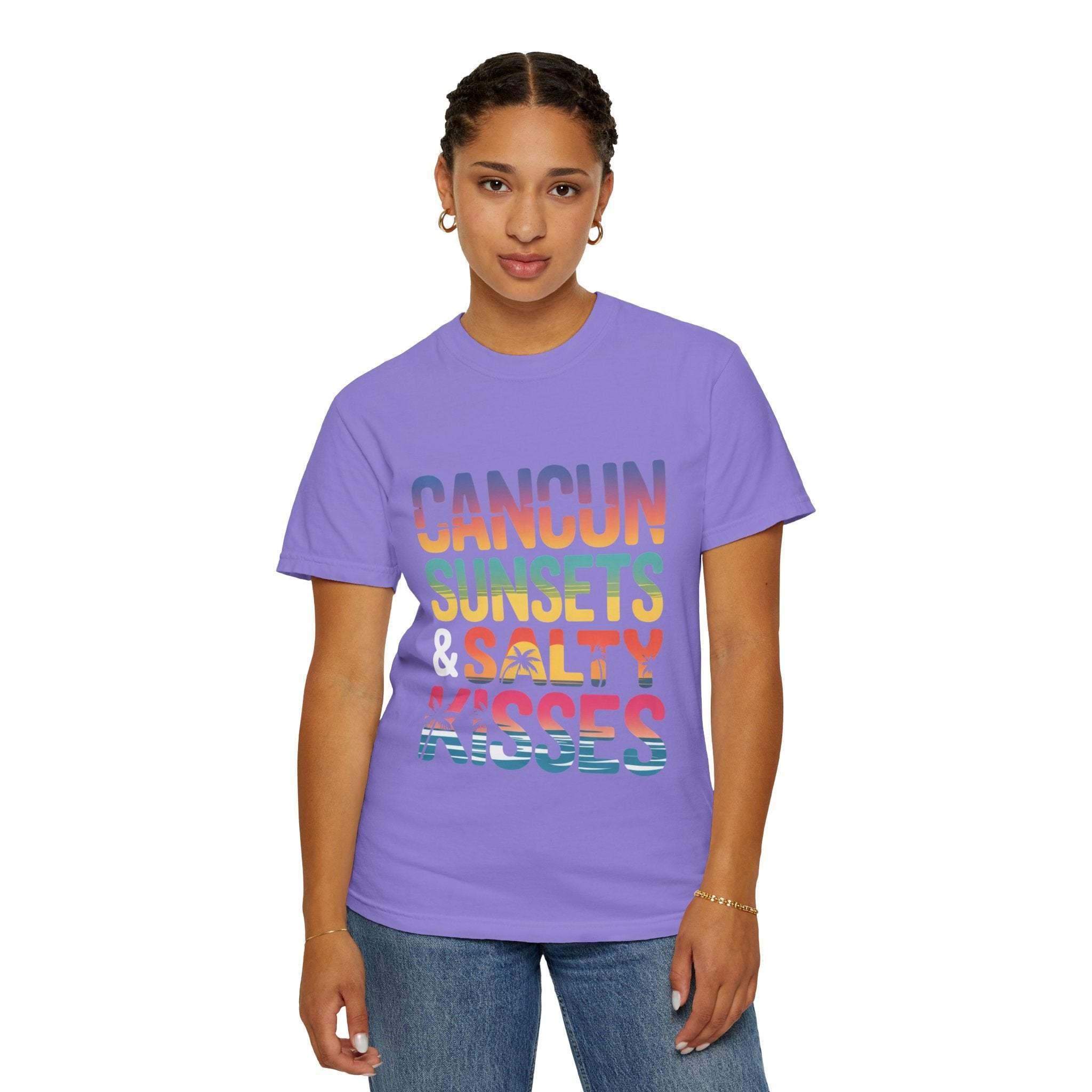Person wearing a purple t-shirt with colorful text on a white background