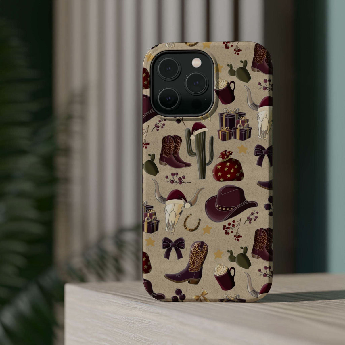 Cowboy Christmas design phone case for iPhone 17 in glossy finish by Printify, featuring festive colors and patterns.