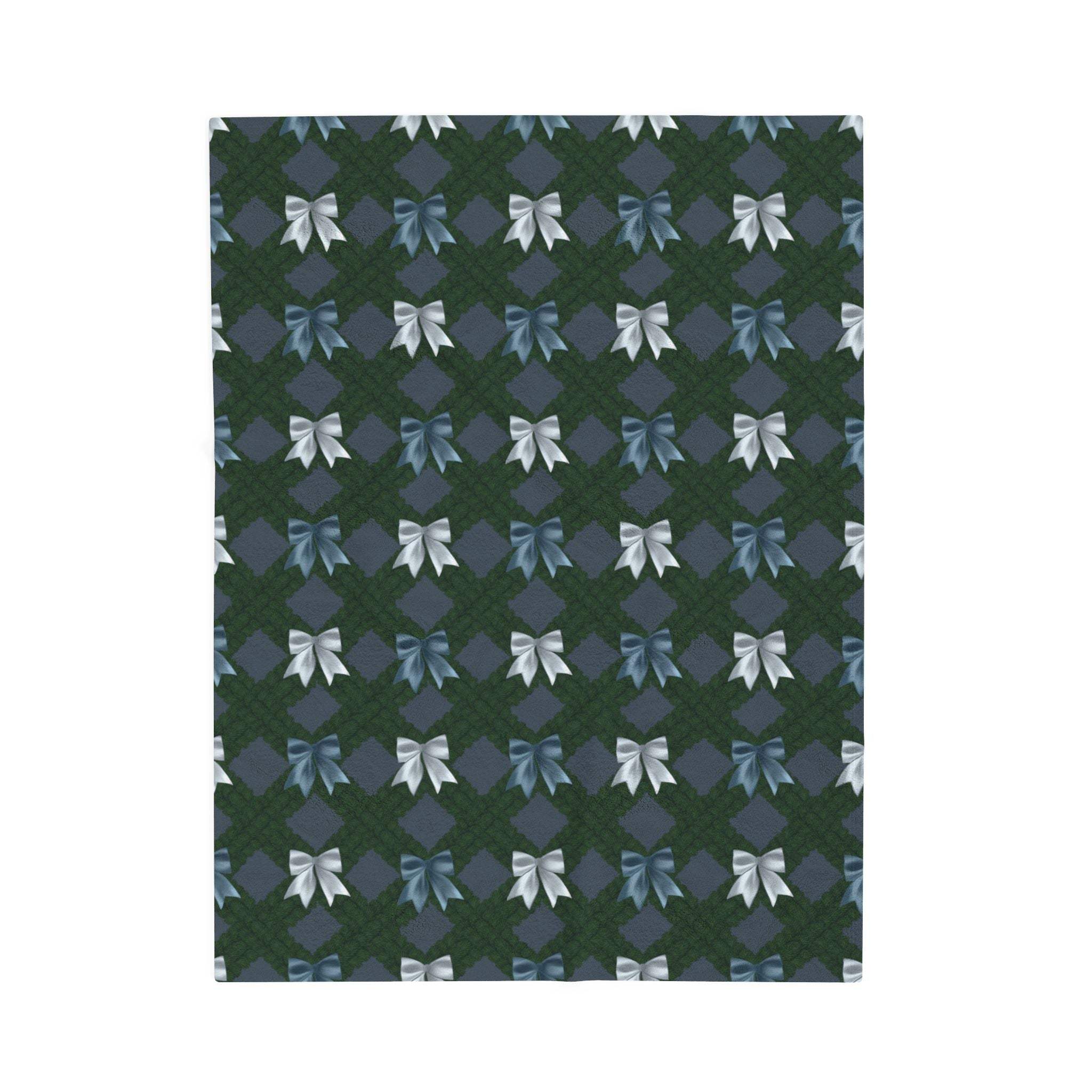 Velveteen plush blanket with winter coquette bows pattern in blue and white on dark green background