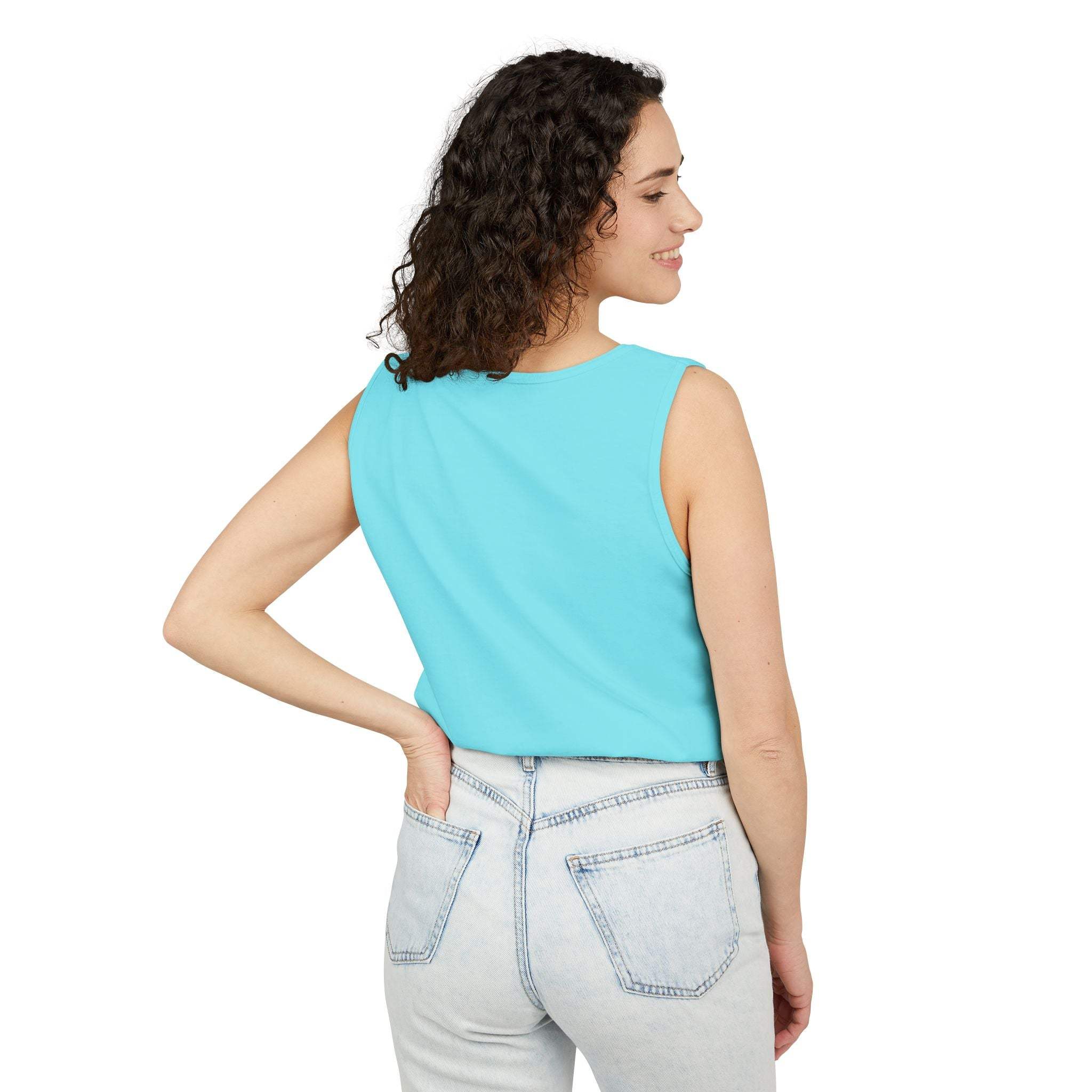 Woman wearing light blue sleeveless tank top paired with light wash jeans viewed from the back
