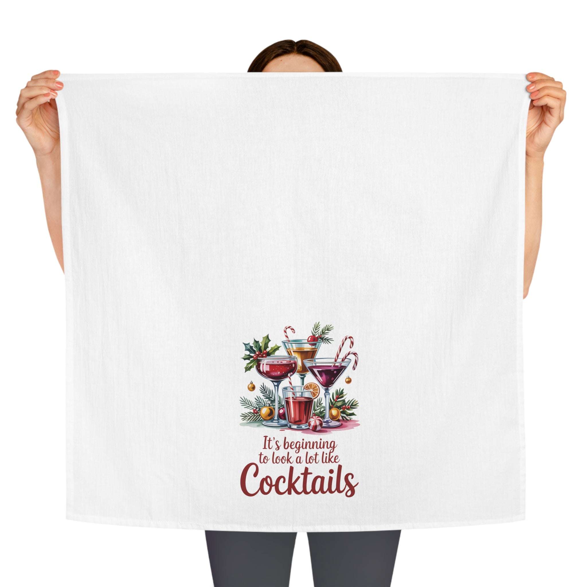 White cotton tea towel with festive 'It's Beginning to Look a Lot Like Cocktails' design by Printify