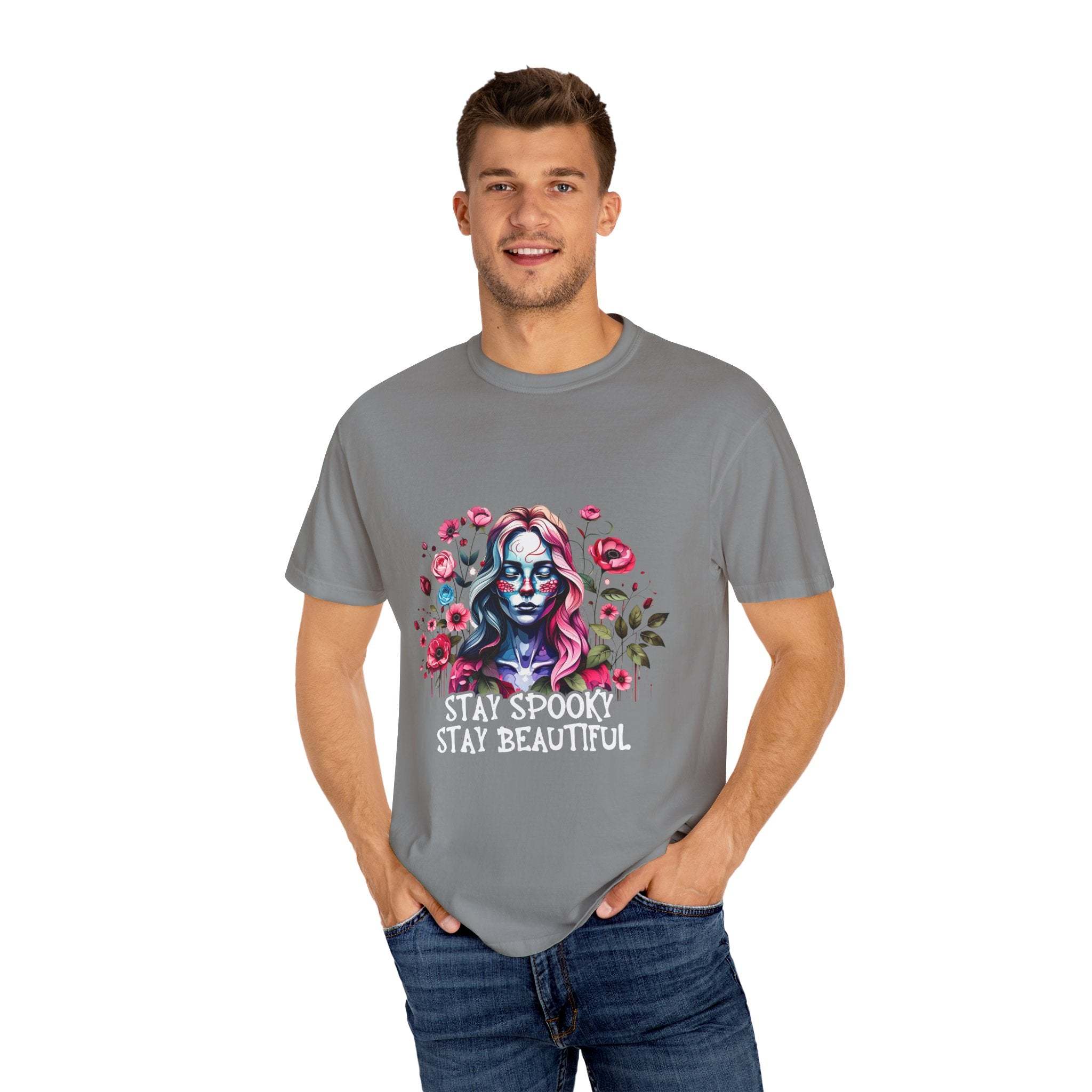 Man wearing gray floral skeleton t-shirt with "Stay Spooky Stay Beautiful" text and pink flower design