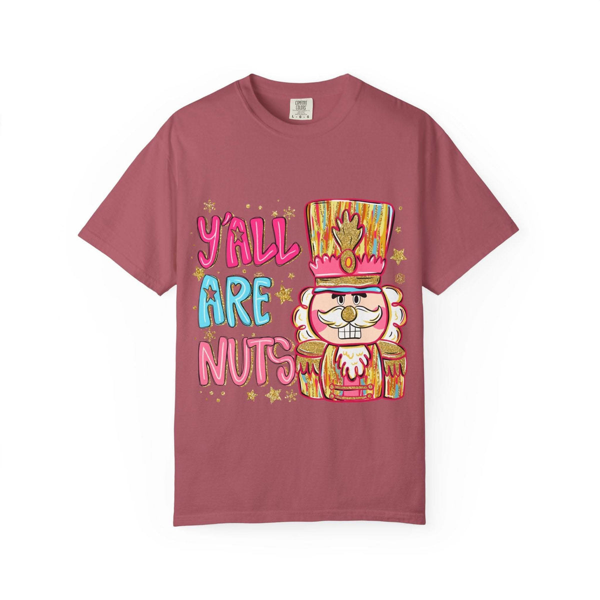 Preppy Yall Are Nuts Nutcracker T-shirt with festive nutcracker graphic on pink cotton fabric