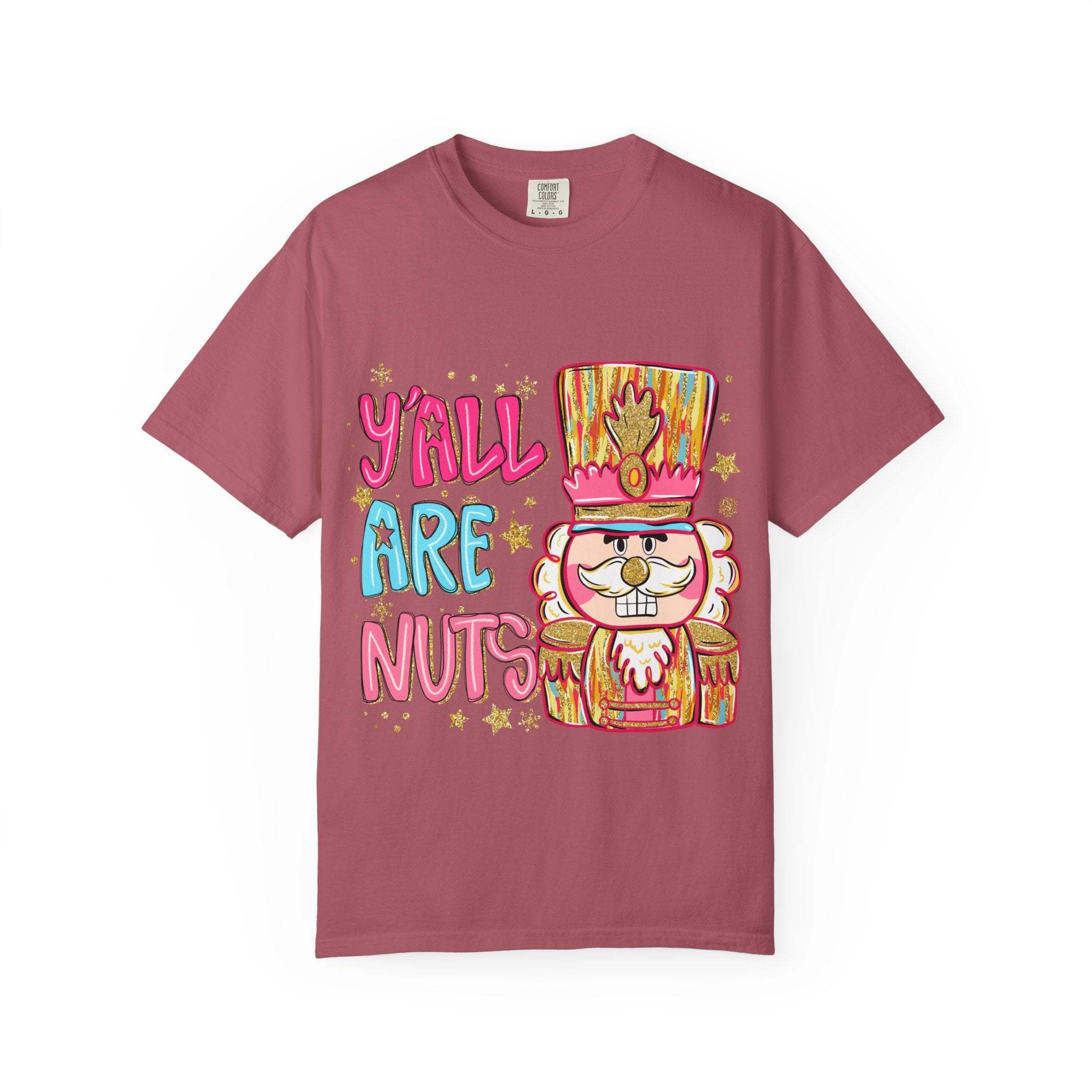 Preppy Yall Are Nuts Nutcracker T-shirt with festive nutcracker graphic on pink cotton fabric
