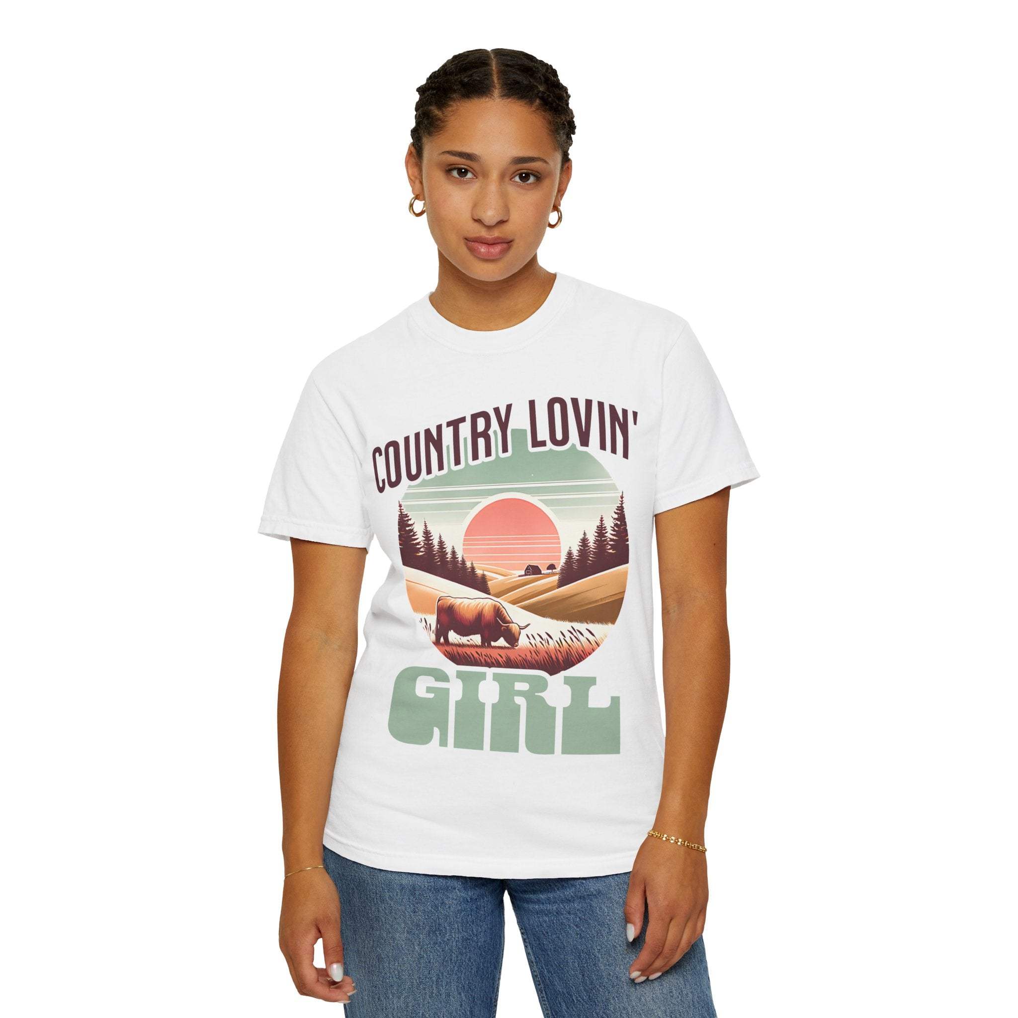 Woman wearing white Country Lovin Girl T-shirt with vintage country sunset design and buffalo image