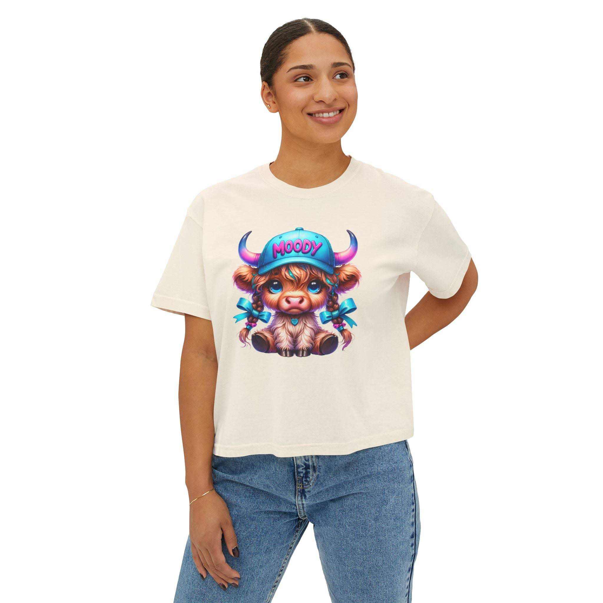 Women's boxy tee with moody girl highland cow graphic, casual vintage style