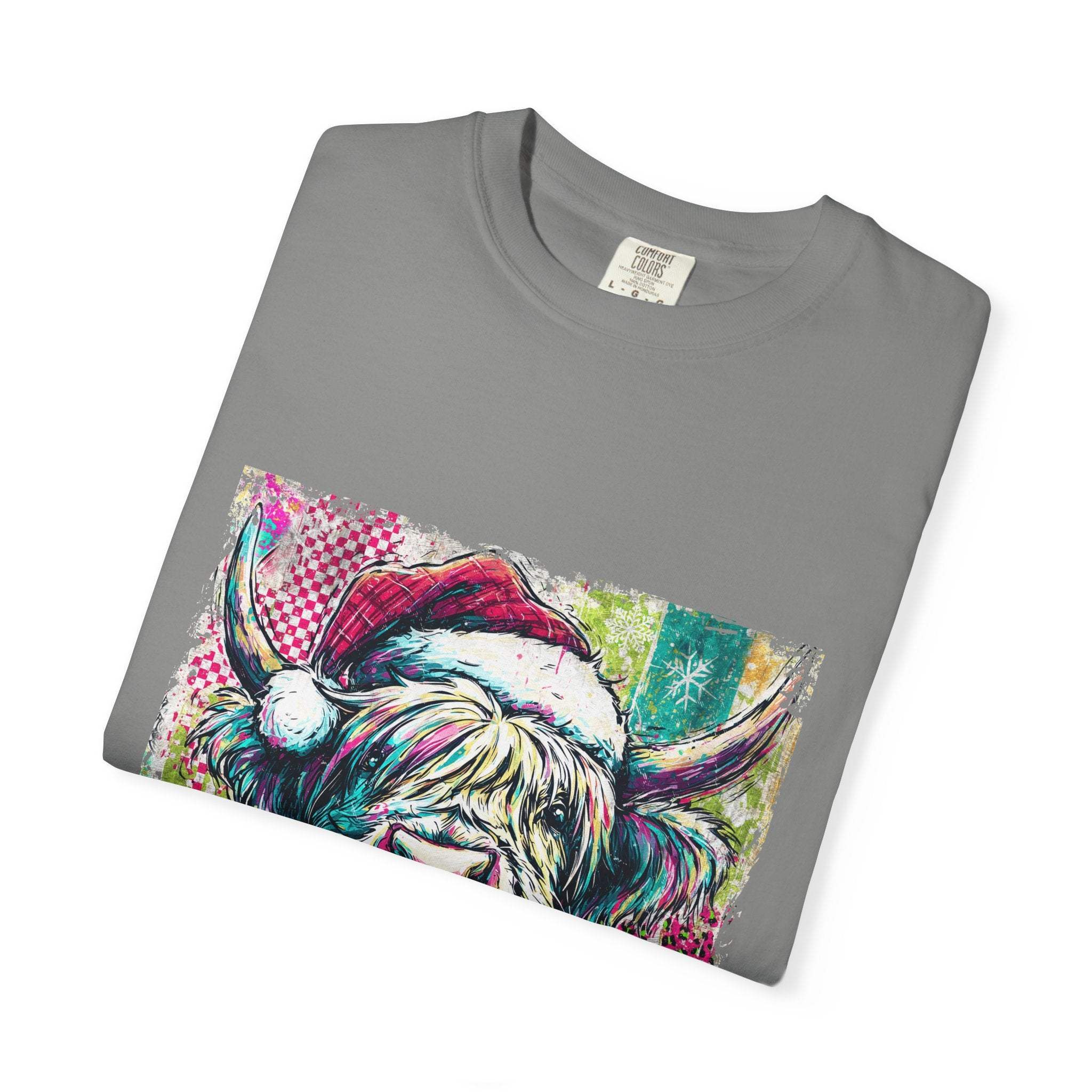 Folded grey Retro Santa Highland Cow T-shirt with colorful festive cow wearing a Santa hat design