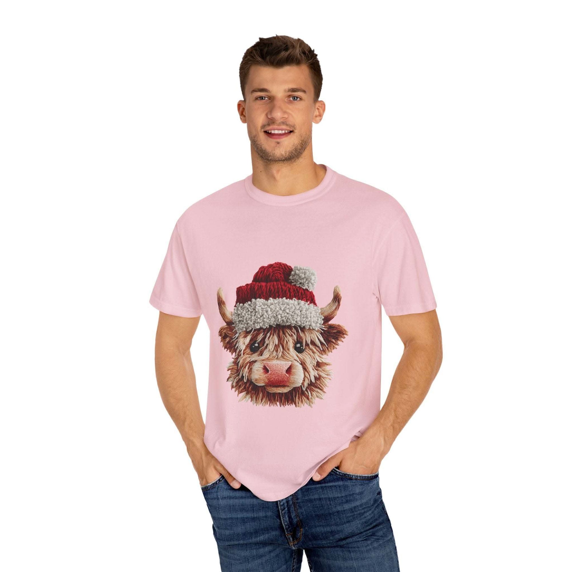 Black t-shirt featuring faux crochet yarn Highland cow Santa print by Printify, perfect for cozy Christmas wear.
