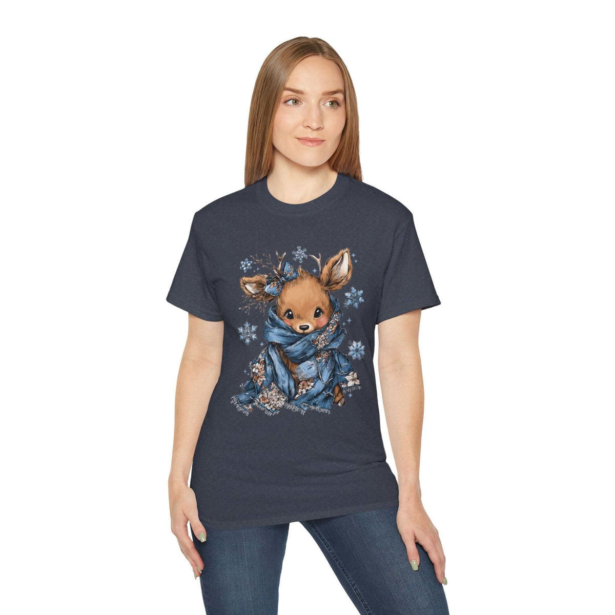White t-shirt with retro patchwork reindeer design wearing blue scarf and surrounded by snowflakes