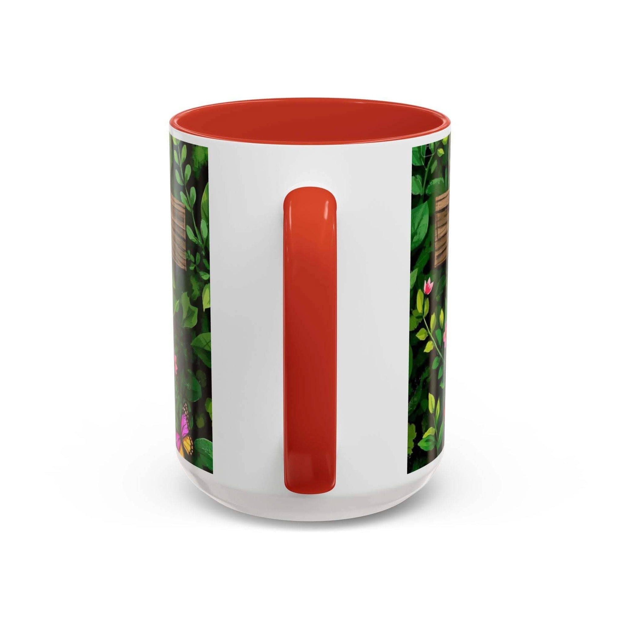 White mug with red interior and handle, featuring a floral pattern on the sides.
