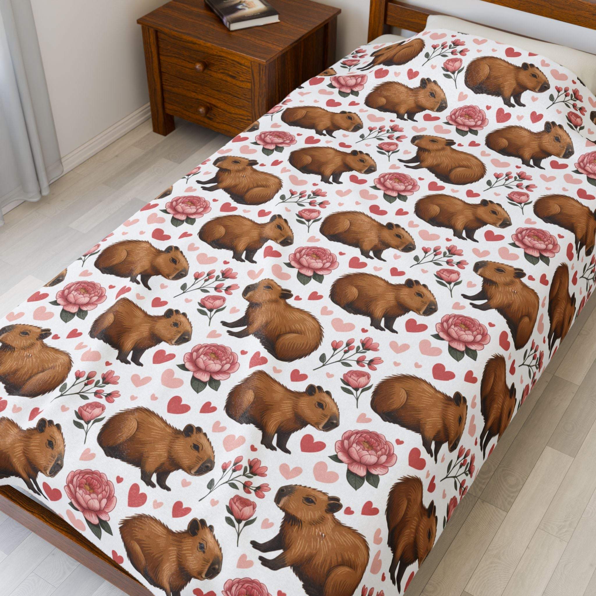 Floral Capybara Valentines plush blanket with soft velveteen and pastel blooms