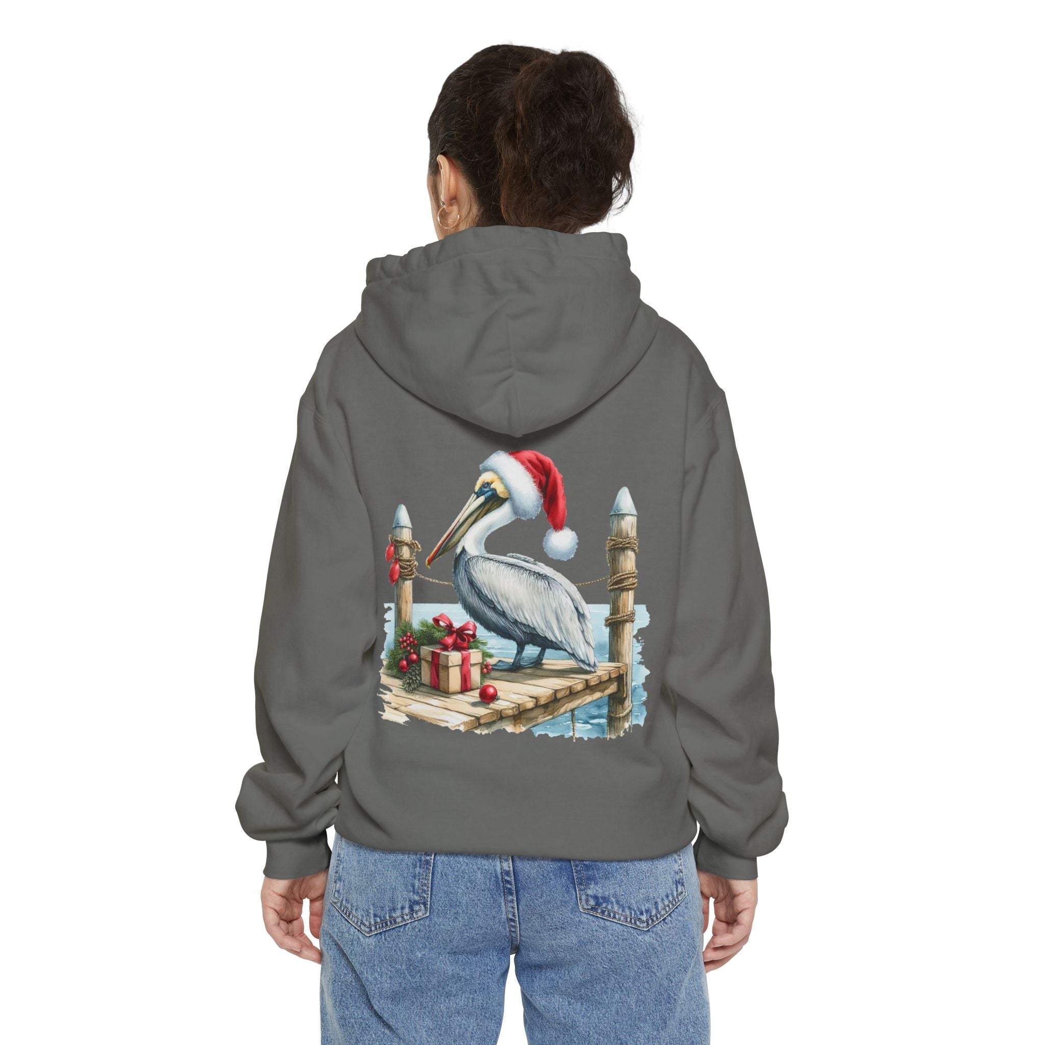 True Navy hoodie featuring a pelican in a Santa hat design by Printify