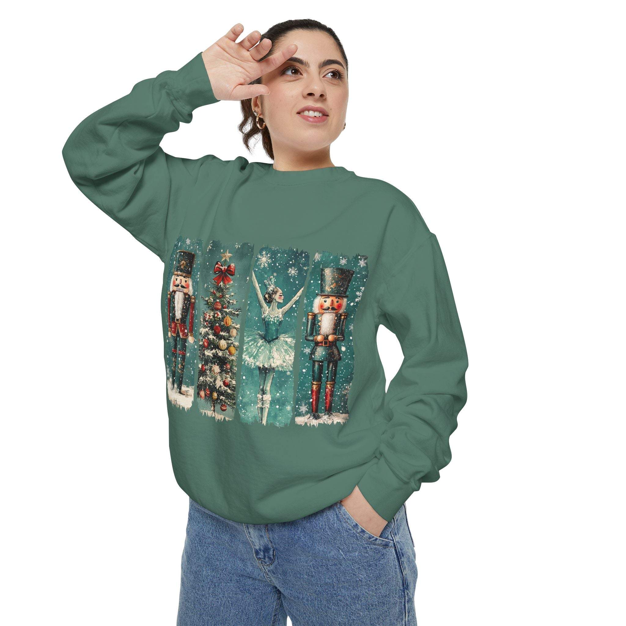 Woman wearing vintage Christmas Nutcracker sweatshirt with watercolor nutcracker and ballet dancer design