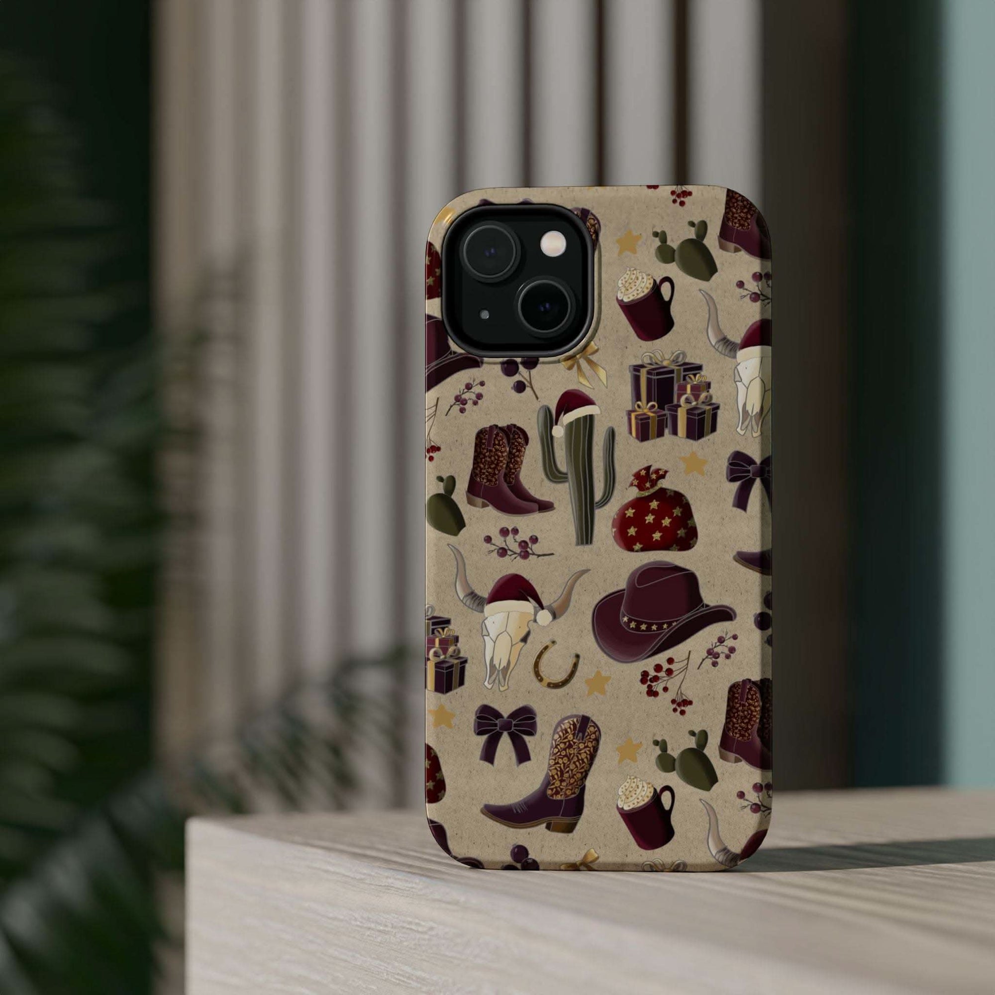 Cowboy Christmas design phone case for iPhone 17 in glossy finish by Printify, featuring festive colors and patterns.