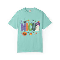 Chalky mint NICU nurse Halloween T-shirt with colorful crayon-style lettering, a smiling ghost in a purple beanie, pumpkin, and candy corn.