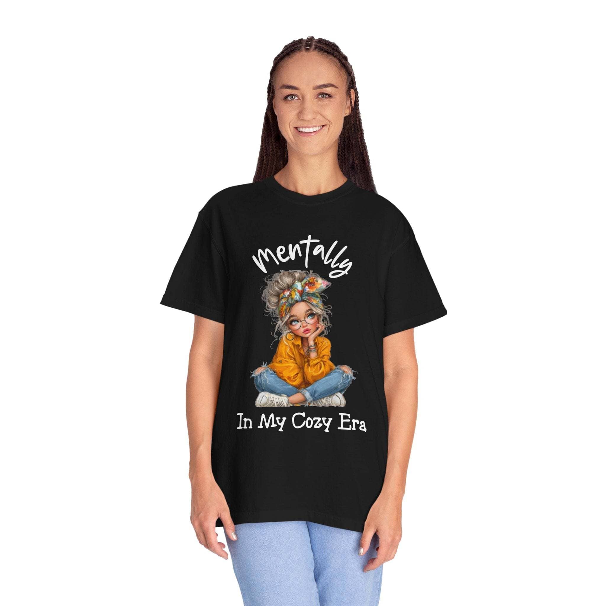 Black "Mentally in My Cozy Era" T-shirt with graphic of a girl sitting cross-legged, soft garment-dyed cotton comfort tee