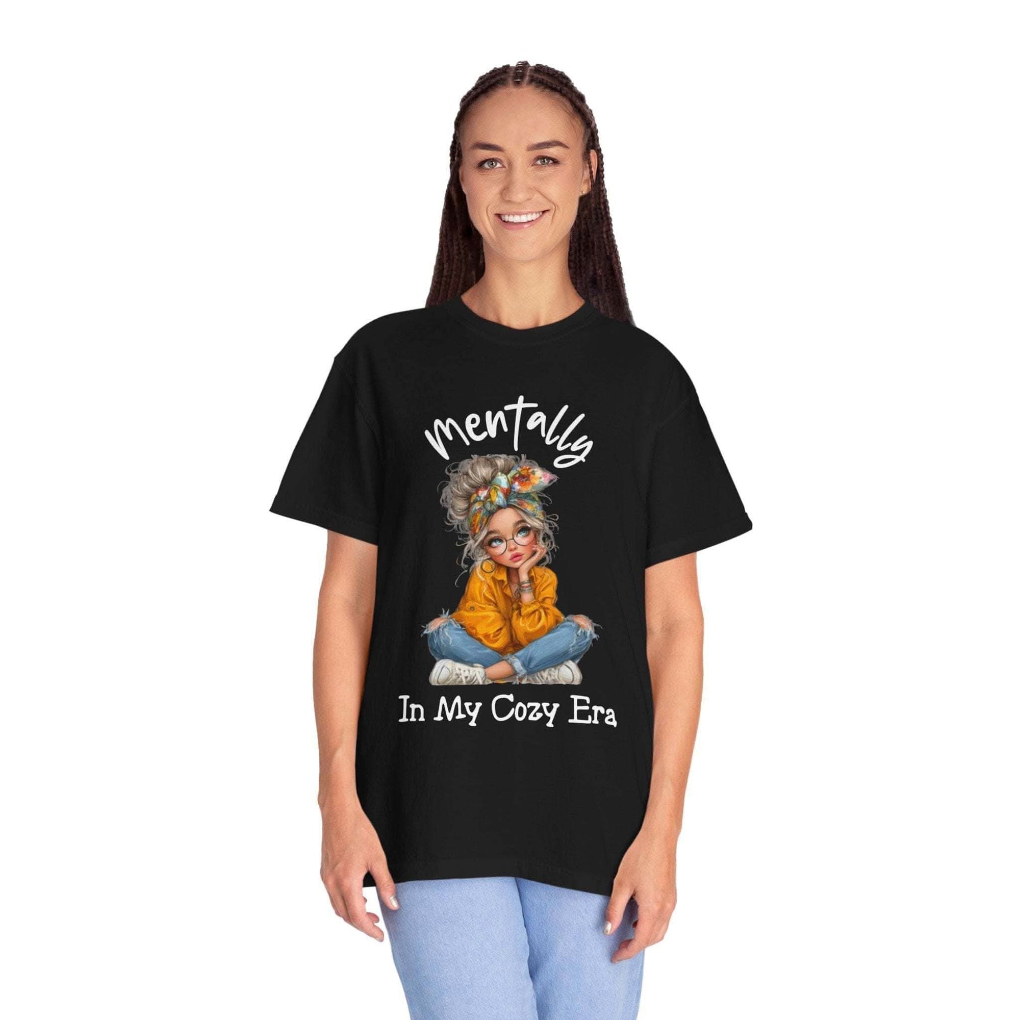Black "Mentally in My Cozy Era" T-shirt with graphic of a girl sitting cross-legged, soft garment-dyed cotton comfort tee