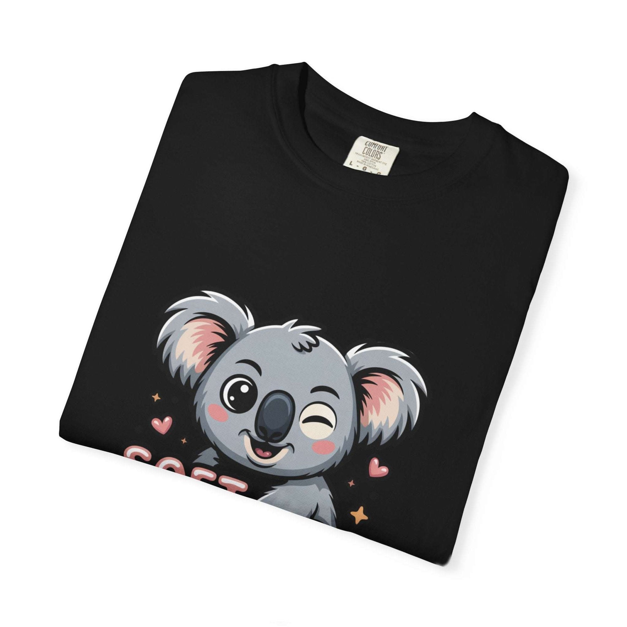 Black T-shirt featuring a playful winking koala graphic with the phrase "Soft on the Outside, Savage on the Inside"
