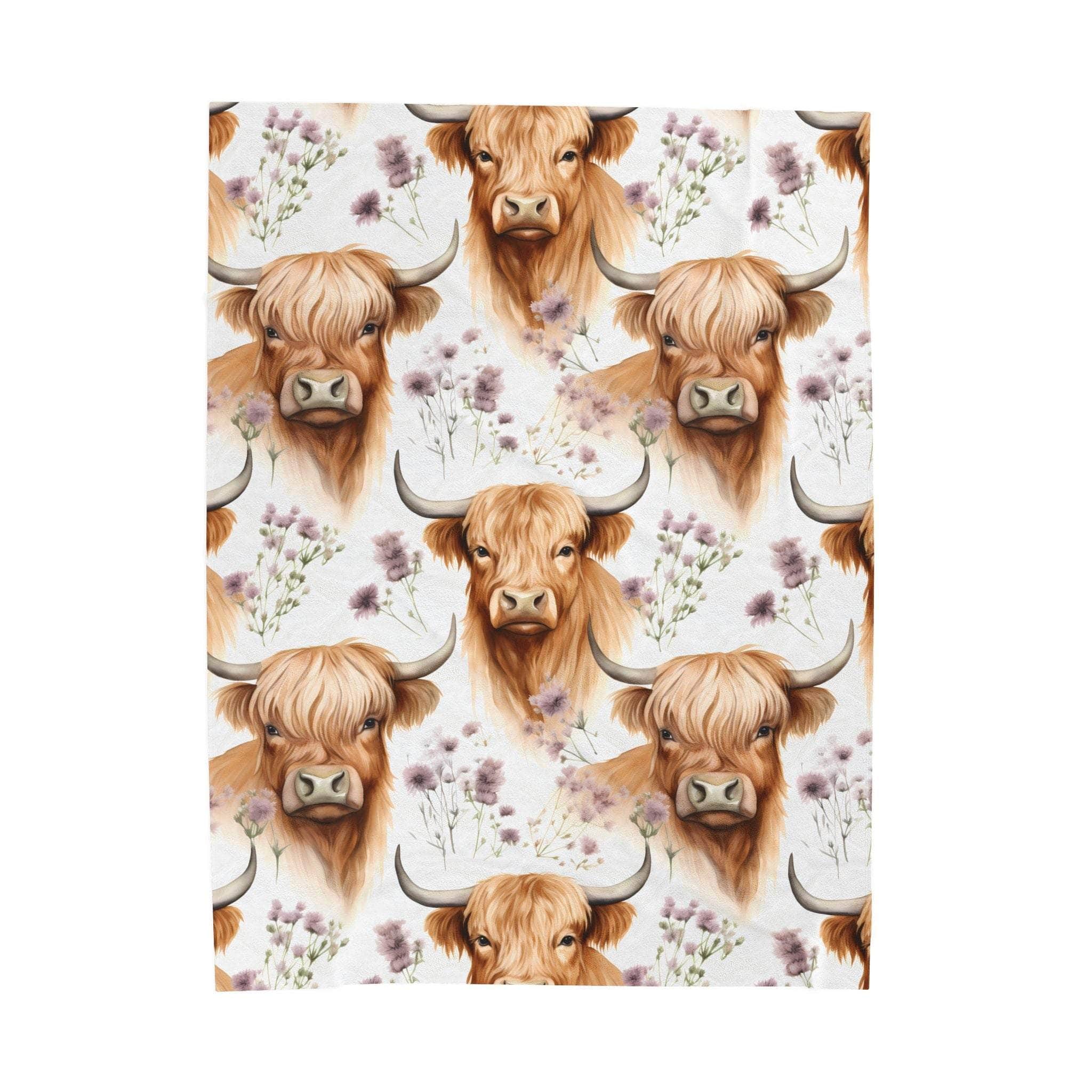 Plush blanket with floral highland cow design, cozy and rustic velveteen polyester fabric.