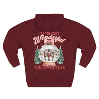 Cozy fleece hoodie with vintage preppy pink snow globe holiday design and adjustable hood