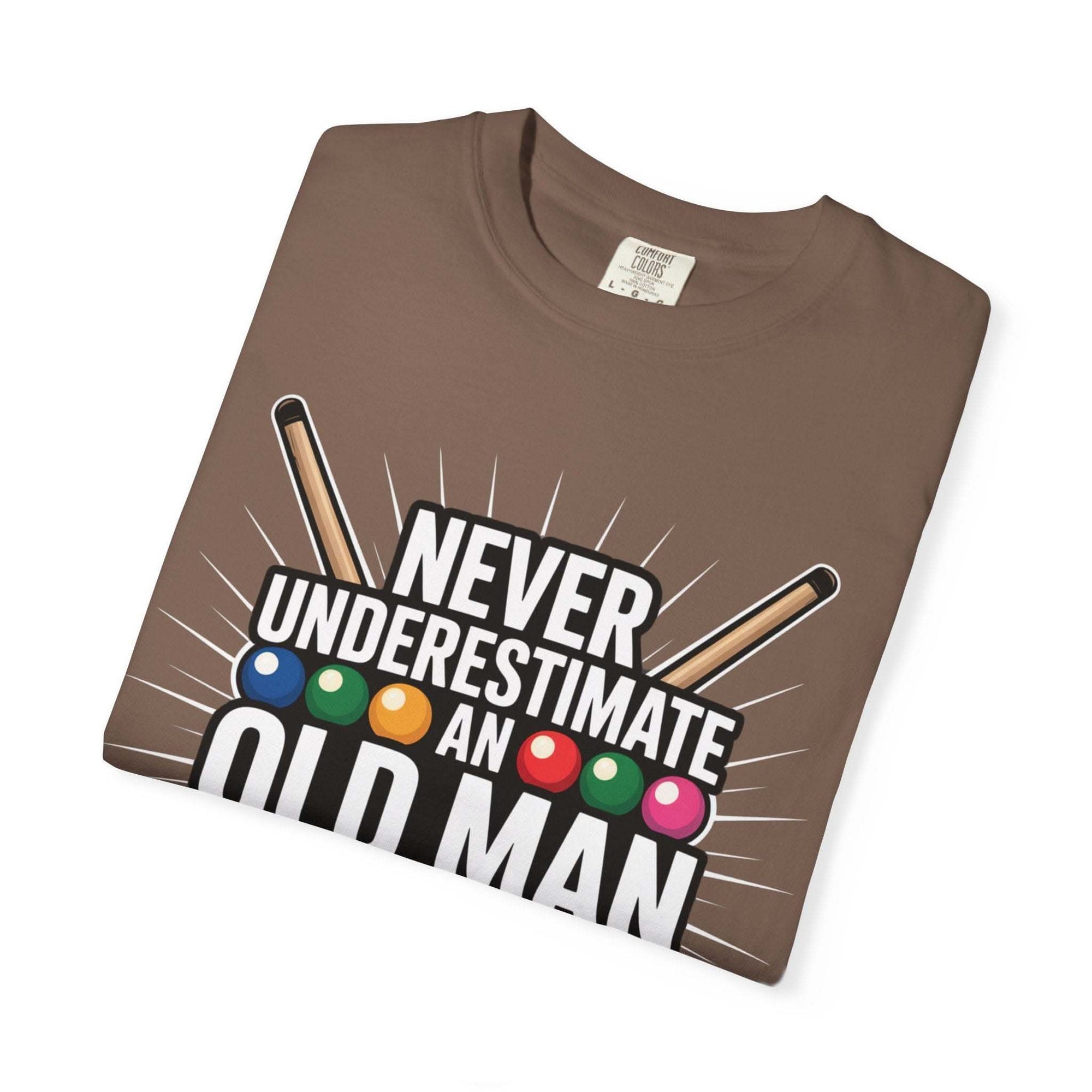 Brown t-shirt with "Never Underestimate An Old Man" text and pool cue graphic