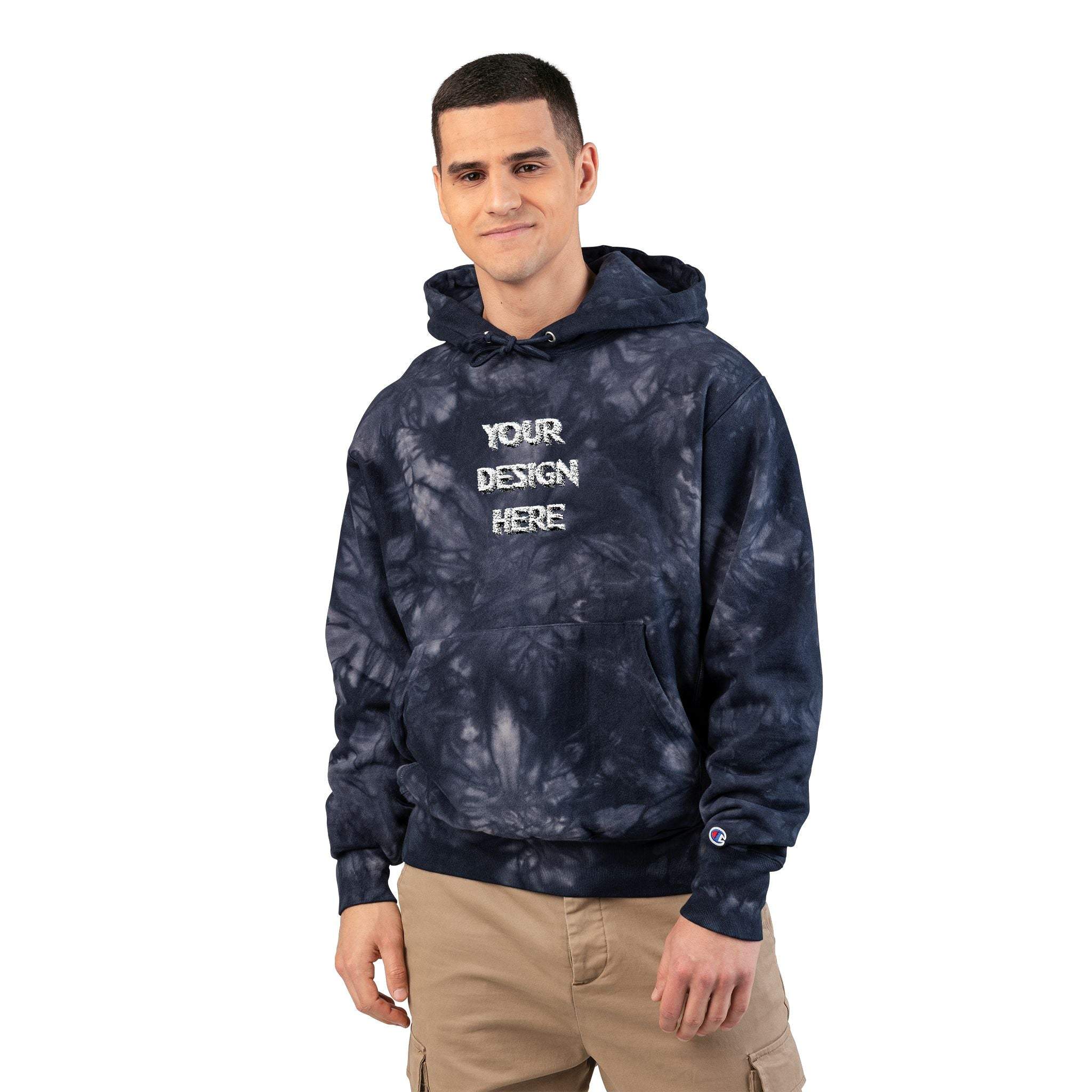 Man wearing custom embroidered tie-dye hoodie with pouch pocket and ribbed cuffs, styled casually