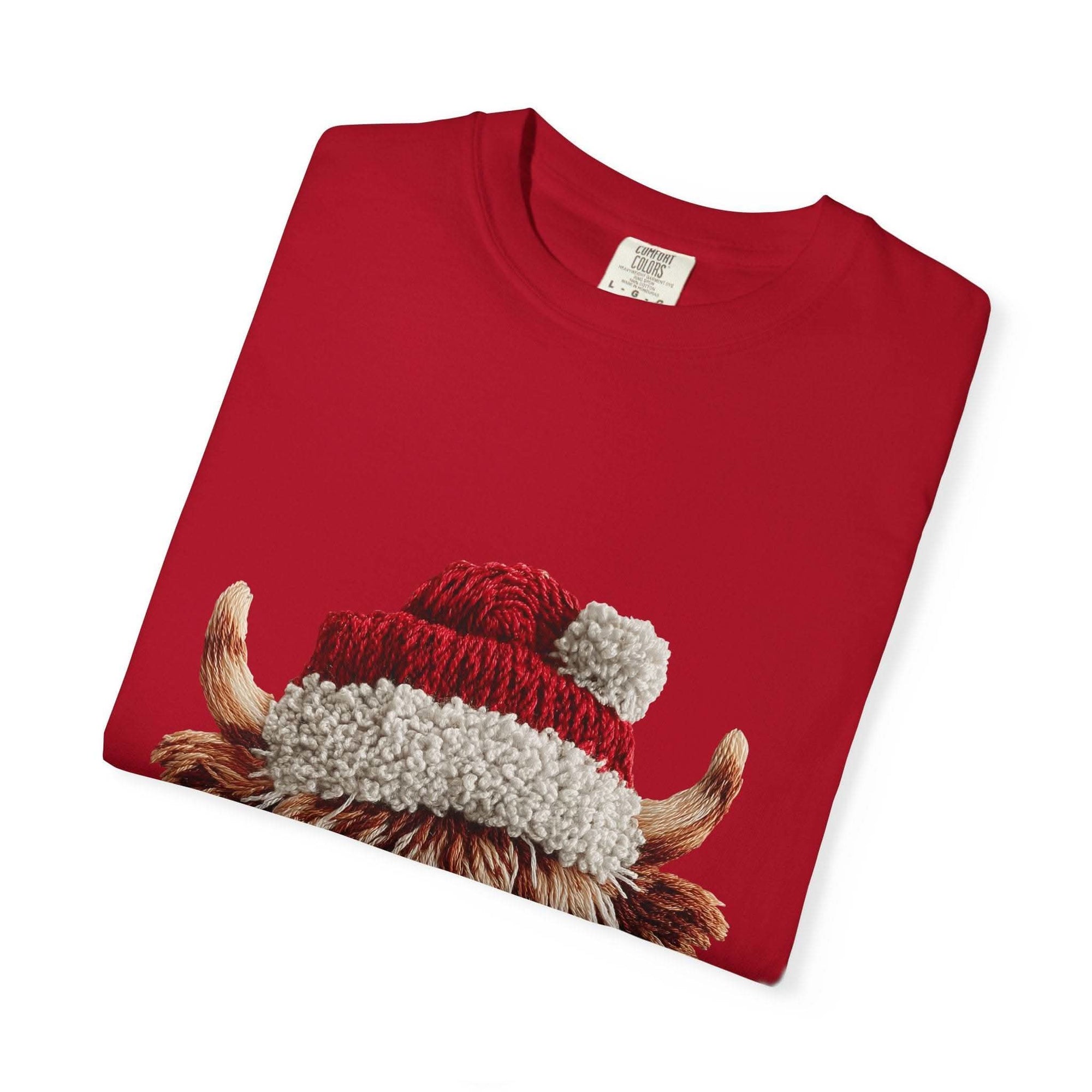 Black t-shirt featuring faux crochet yarn Highland cow Santa print by Printify, perfect for cozy Christmas wear.