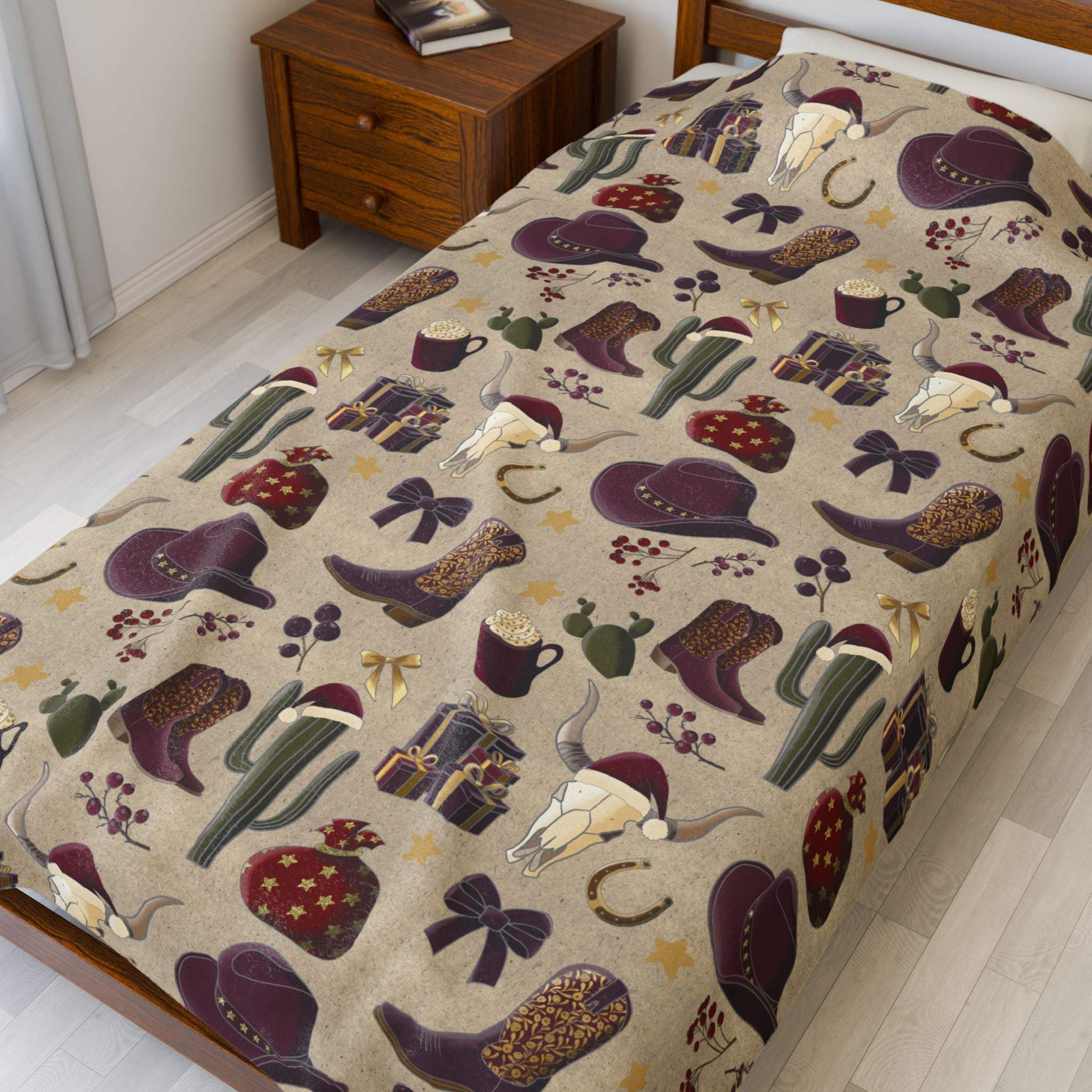 Cowboy Christmas plush blanket with festive western-themed design on bed