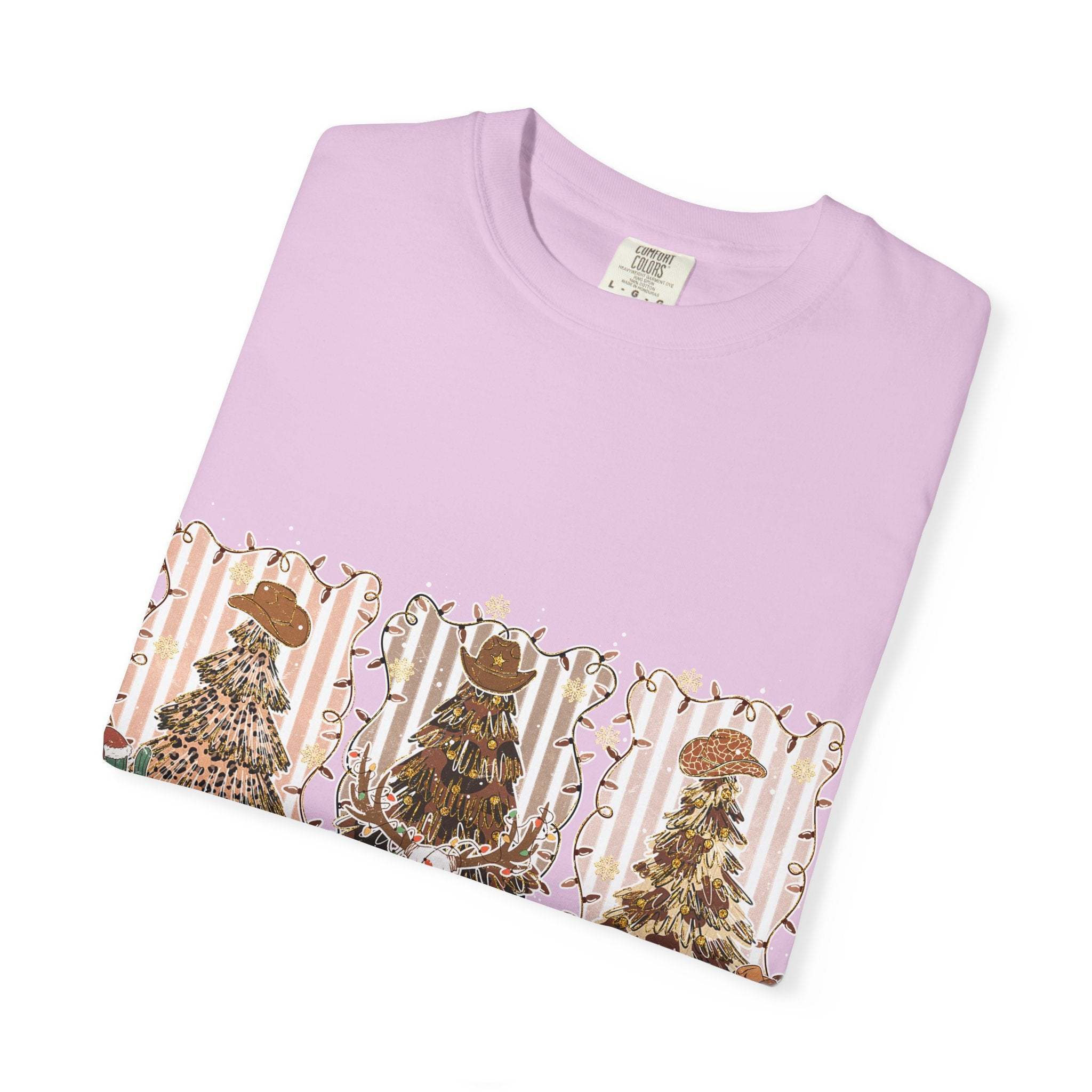 Cowboy Howdy Christmas t-shirt with festive cowboy hat trees on light purple fabric