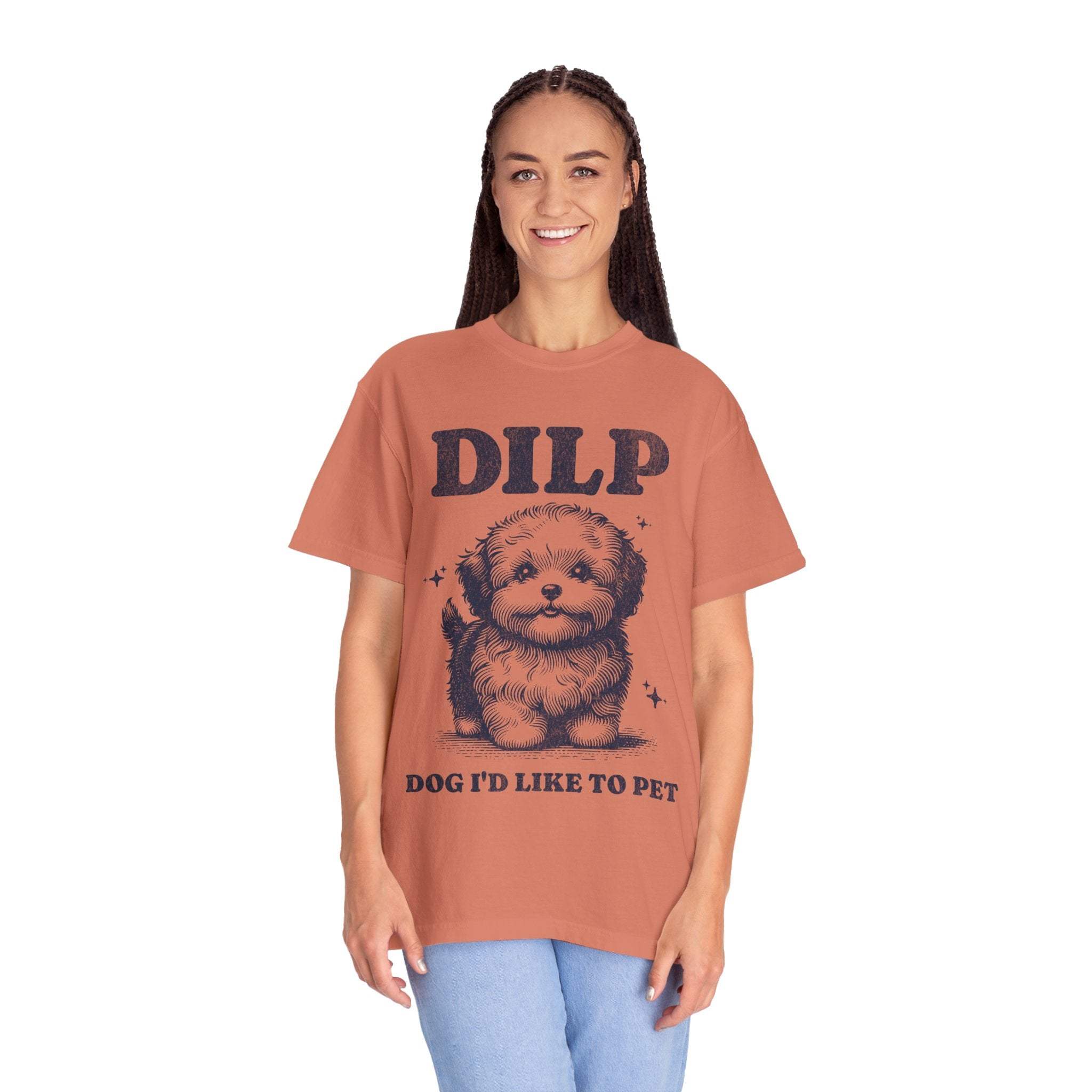 Garment-dyed t-shirt with cute dog illustration and DILP Dog I'd Like To Pet text worn by smiling woman