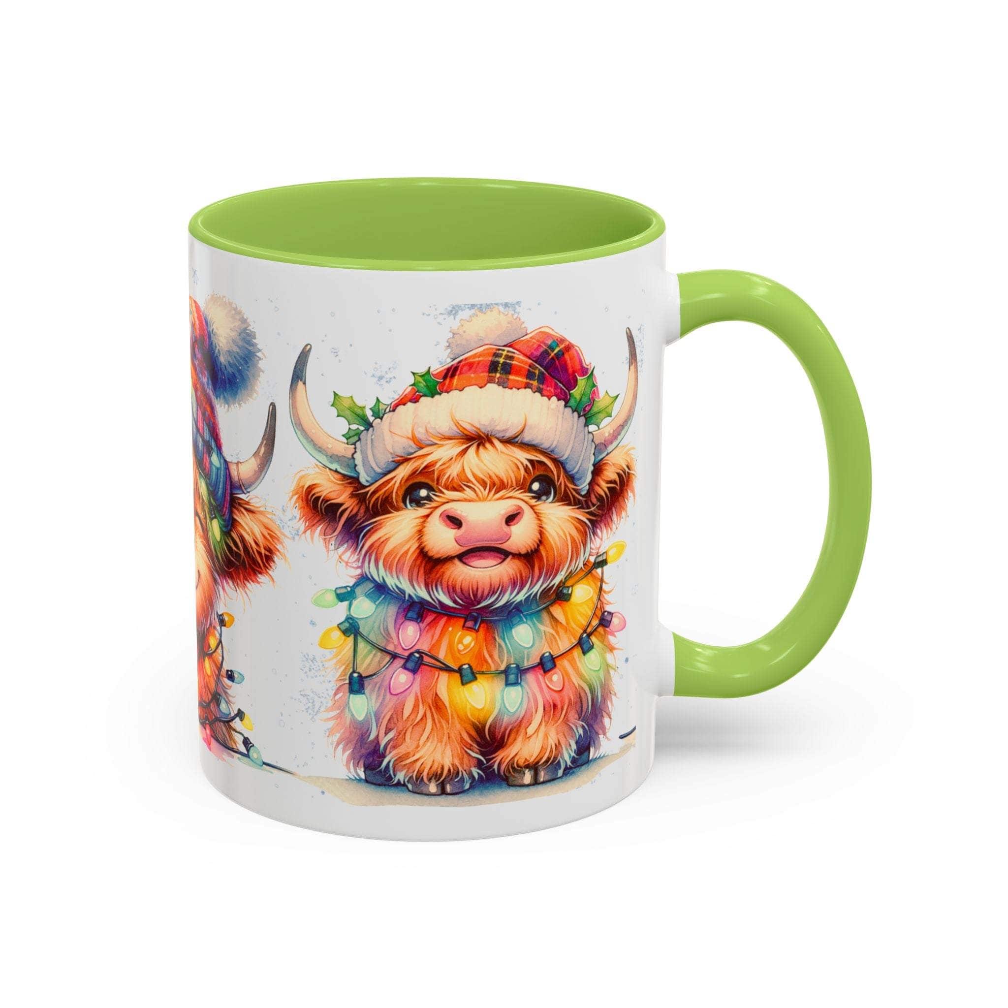 Mug with a colorful highland cow design and green interior and handle on a white background