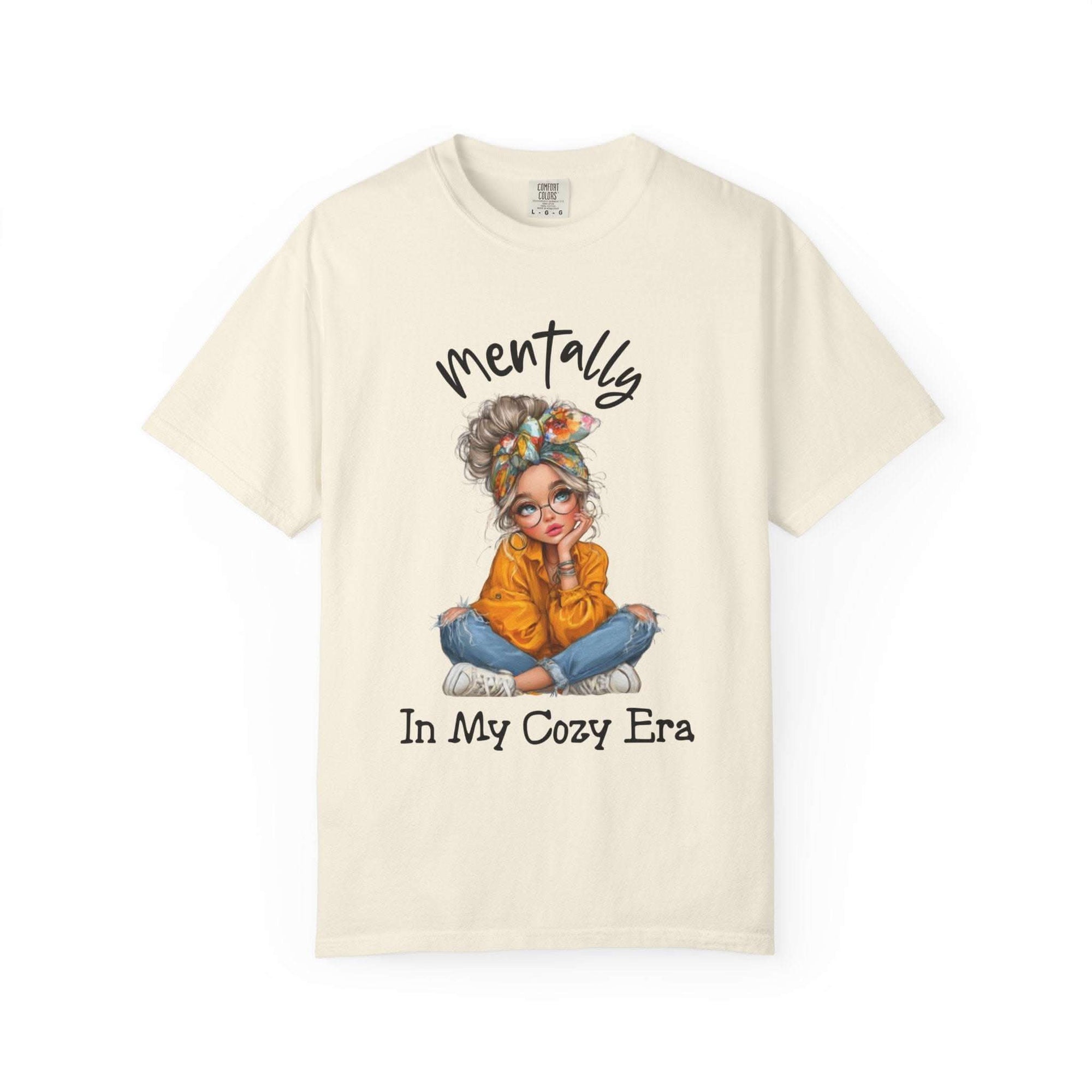 Mentally in my Cozy Era T-shirt with hand-lettered text and cozy girl illustration on soft garment-dyed cotton tee