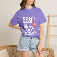 Dont Make Me Put My Foot Down flamingo graphic T-shirt with bold white text on vintage dyed cotton fabric