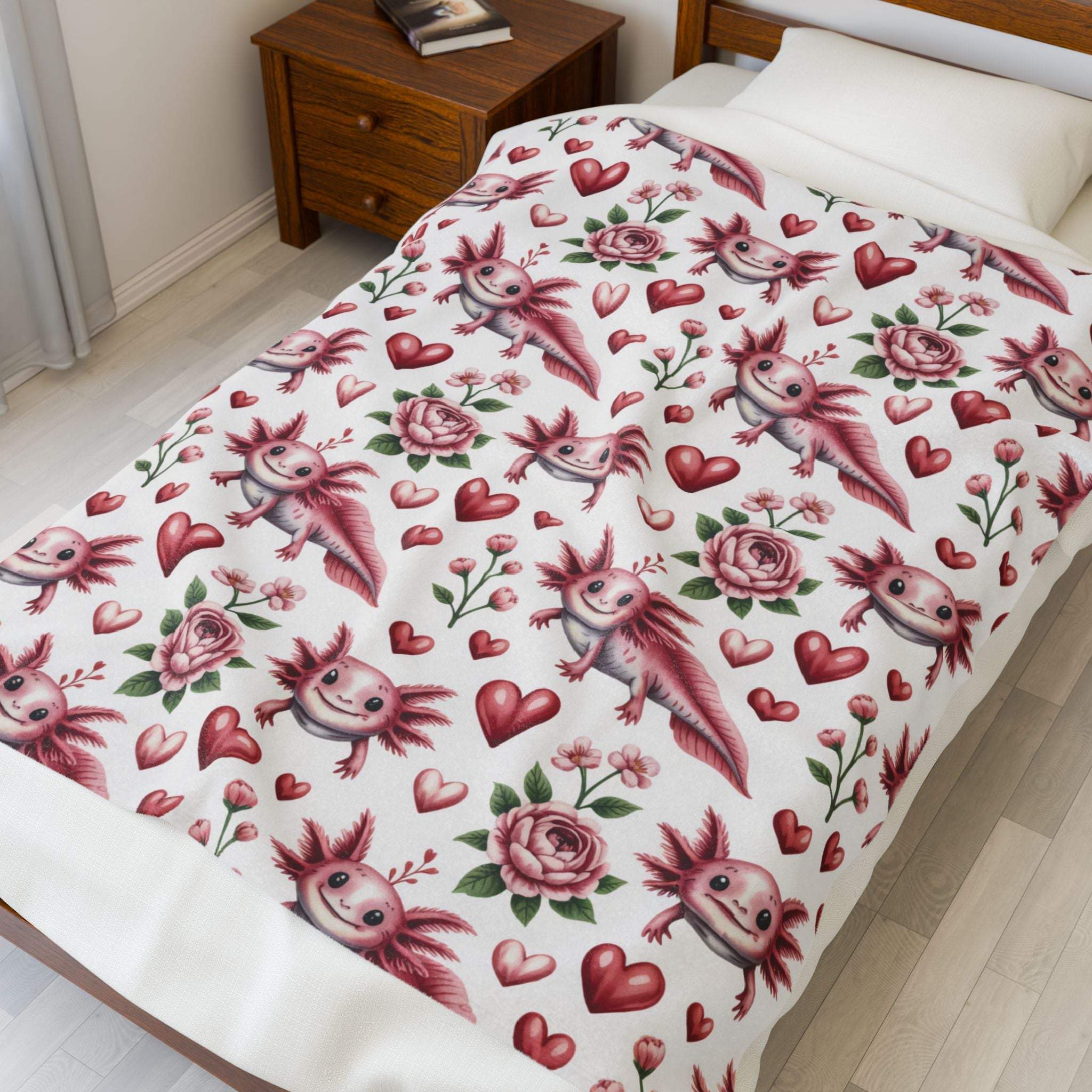 Floral axolotl blanket with heart and blossom design on soft velveteen fabric
