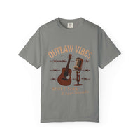 Gray t-shirt with 'Outlaw Vibes' graphic design featuring a guitar, microphone, and barbed wire on a white background.