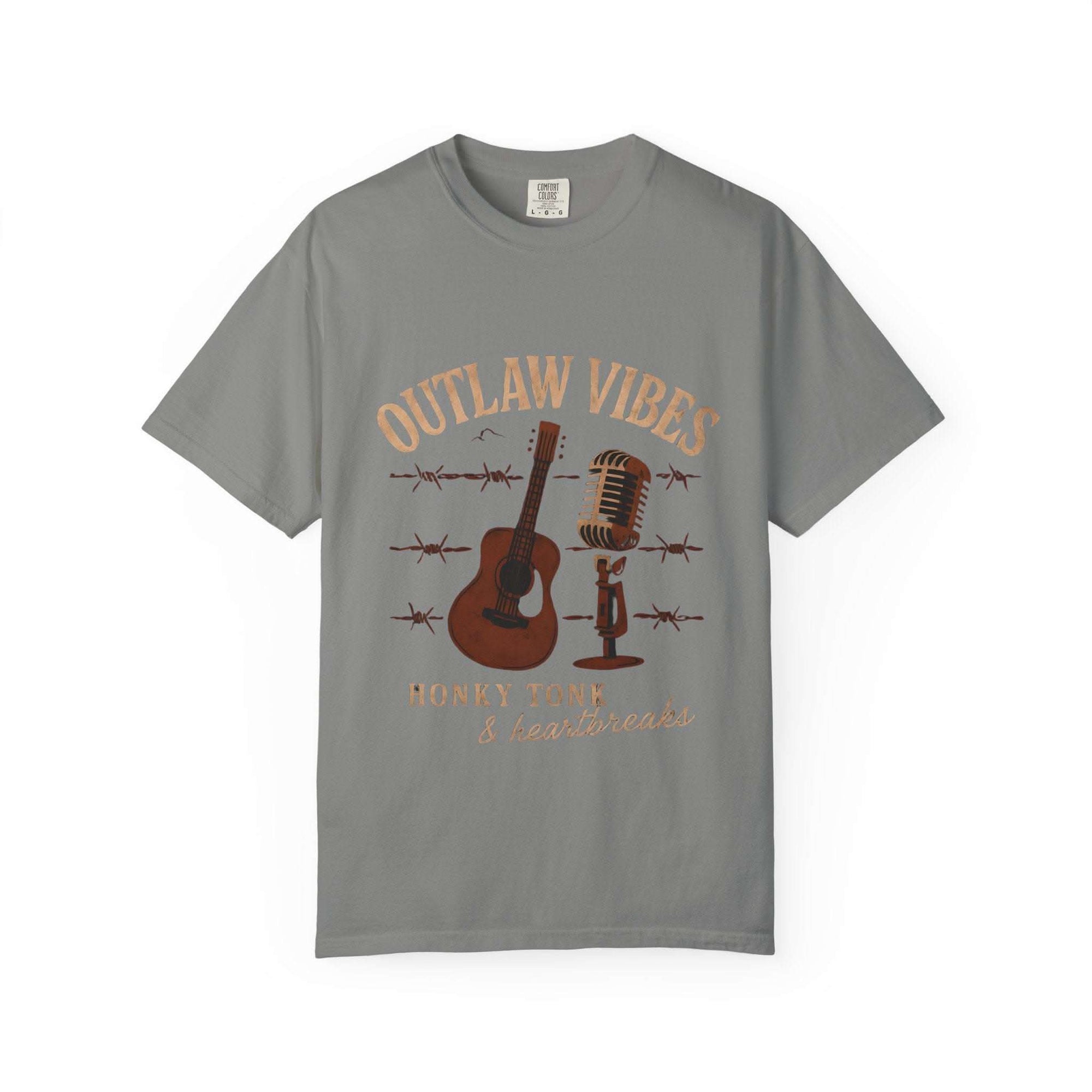 Gray t-shirt with 'Outlaw Vibes' graphic design featuring a guitar, microphone, and barbed wire on a white background.