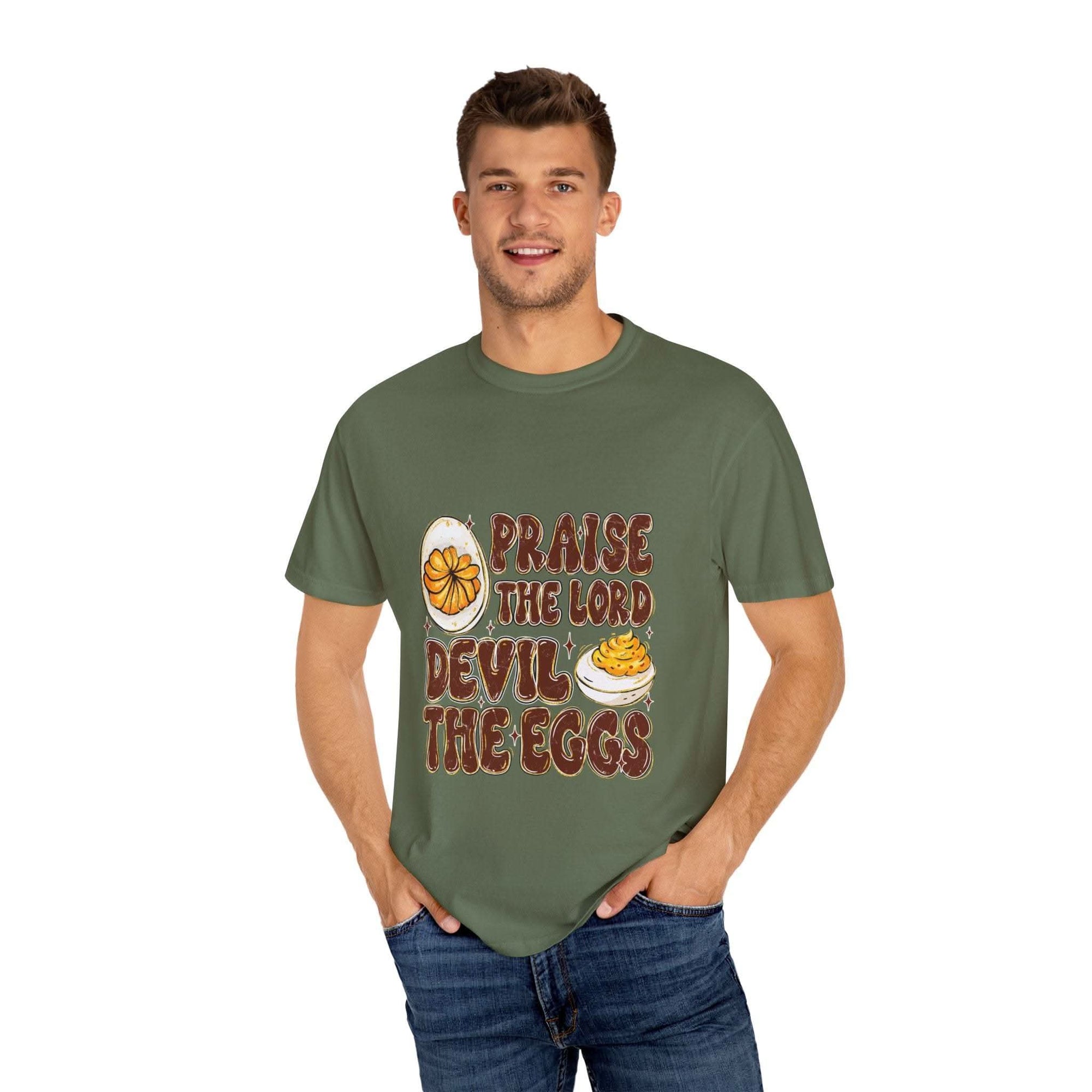 White cotton t-shirt featuring 'Praise the Lord, Devil the Eggs' design, perfect for Easter and Christian apparel.