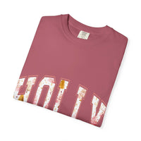 Folded Varsity Holly Jolly T-shirt in festive pink garment-dyed cotton with holiday print