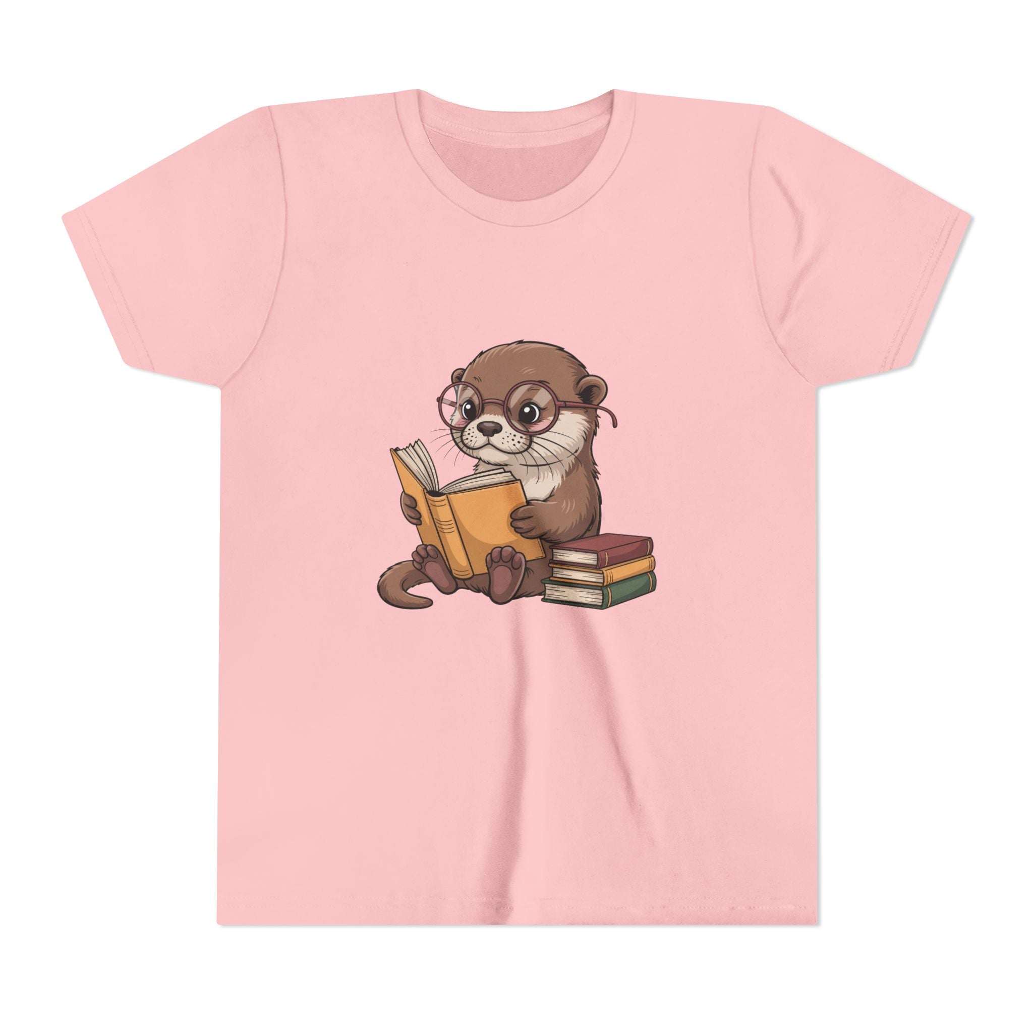 Pink t-shirt with an otter reading a book graphic on a white background