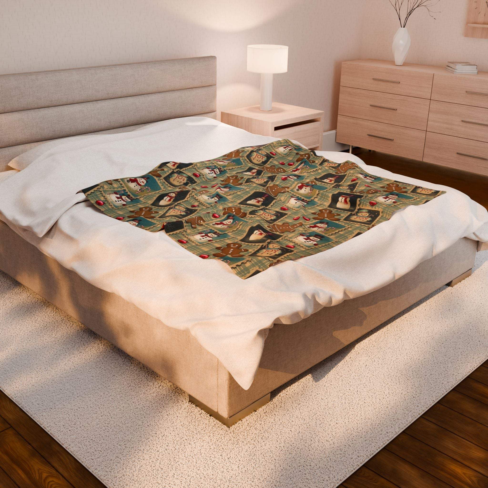 Plush blanket with retro Christmas watercolor design on bed in cozy bedroom setting